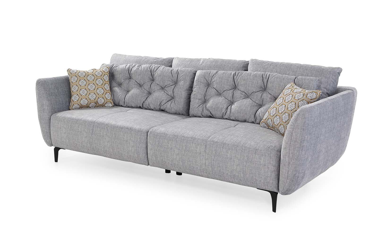 Big Sofa Spa: Graues Sofa mit breiten Armlehnen, segmentierter Rückenlehne und ausgeklappter Schlaffunktion aus Frontalperspektive.