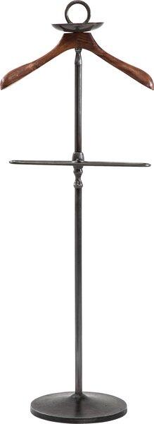 Herrendiener Cosmopolitan: Eleganter Garderobenständer mit gebogenem Holzelement, Kleiderstange und Ablagefläche für Accessoires, aus Stahl und Mango-Holz.