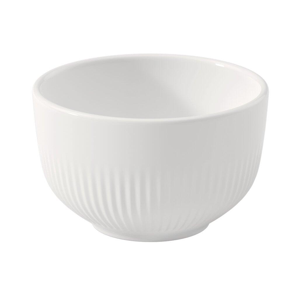 Weiße, runde Dipschale Afina von Villeroy & Boch mit gewellter Oberfläche, aus der Vogelperspektive dargestellt.