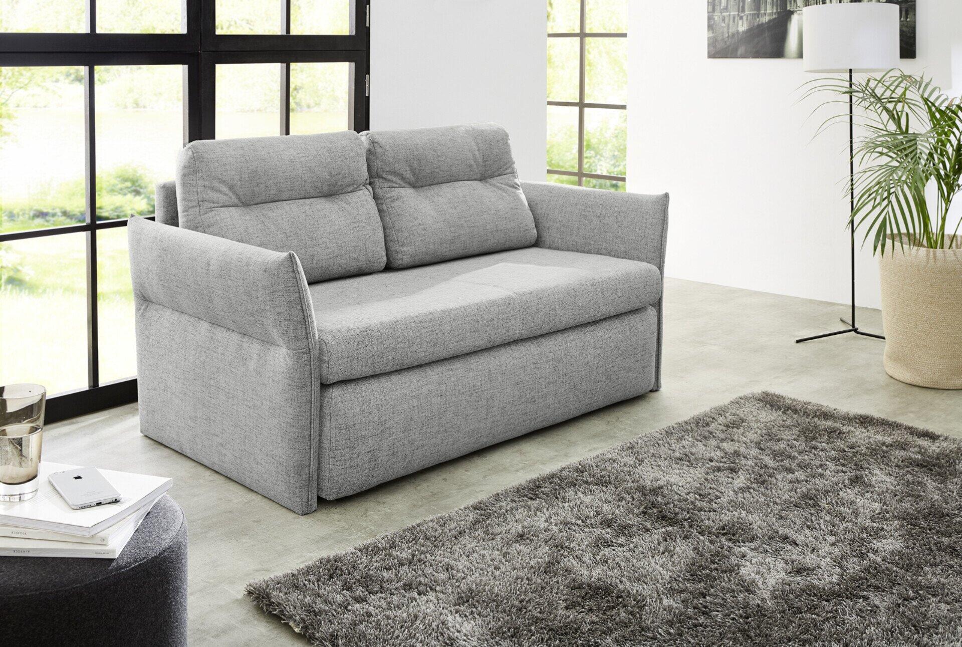 Schlafsofa Tim in grau mit schlichtem, modernem Design und leicht abgerundeten Armlehnen, frontal leicht erhöht fotografiert.