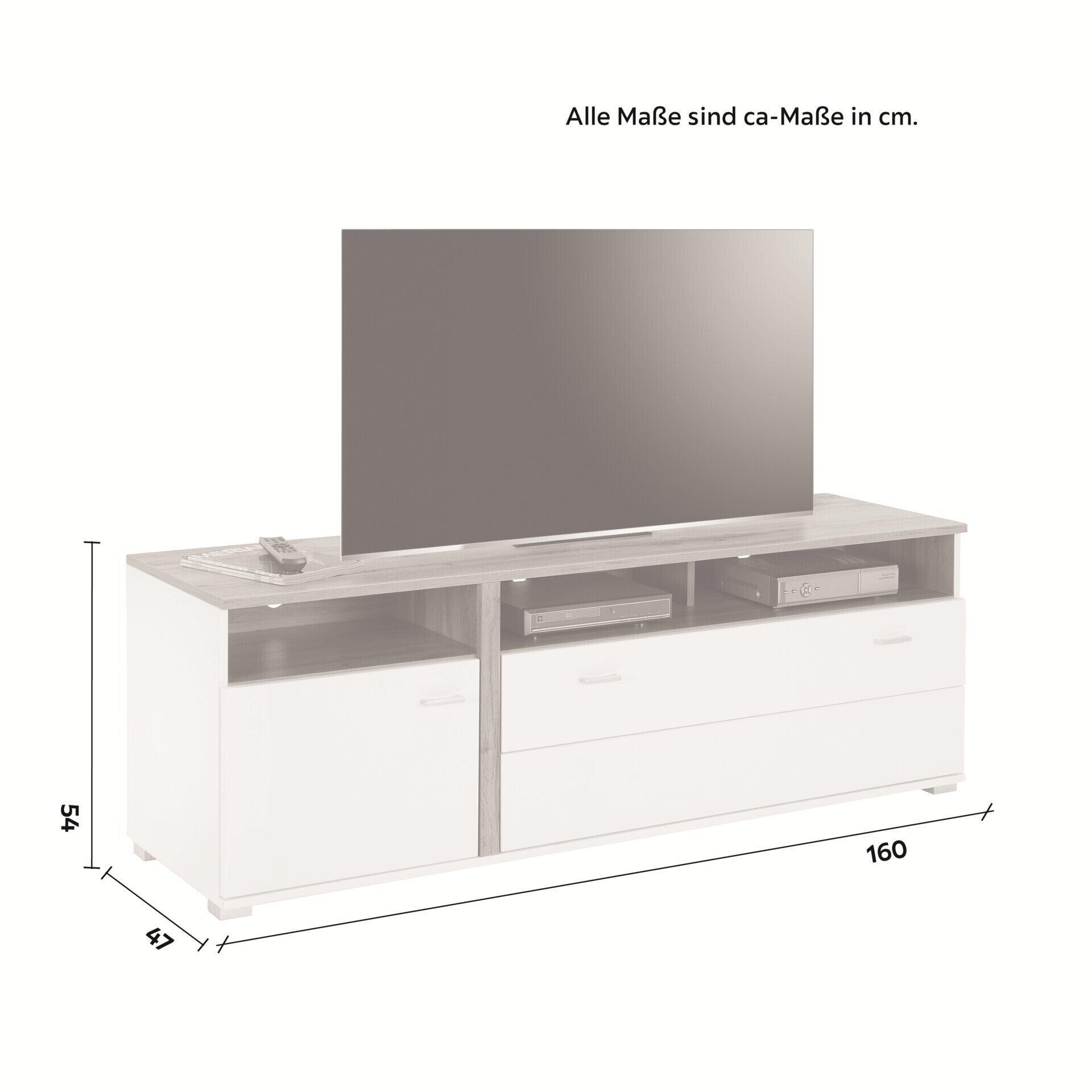 TV-Unterschrank Alamo mit weißer, glänzender Front, einer Schublade, einer Auszugfläche in Holzoptik und einer Holztür, präsentiert mit diversen Multimedia-Geräten.
