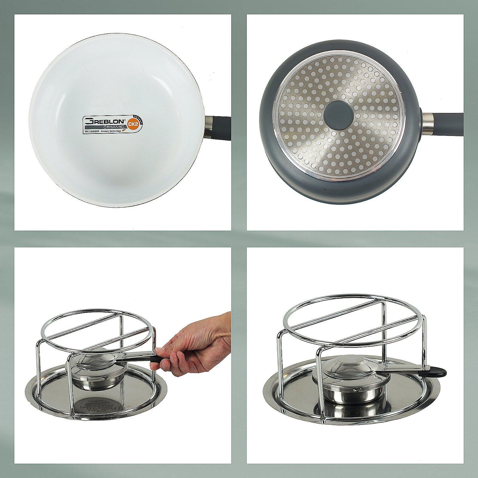 Käsefondue-Set Lancy: Silberfarbener Servierwagen mit drei Tabletts, das obere Tablett zeigt eine weiße Oberfläche mit silbernem Rand und Logo sowie eine strukturierte Oberfläche mit kleinen Löchern.