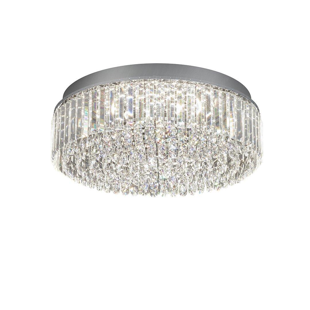 Deckenleuchte Royal mit kugelförmigem, kristallartigen Schirm, der das Licht reflektiert und einen glitzernden Effekt erzeugt.