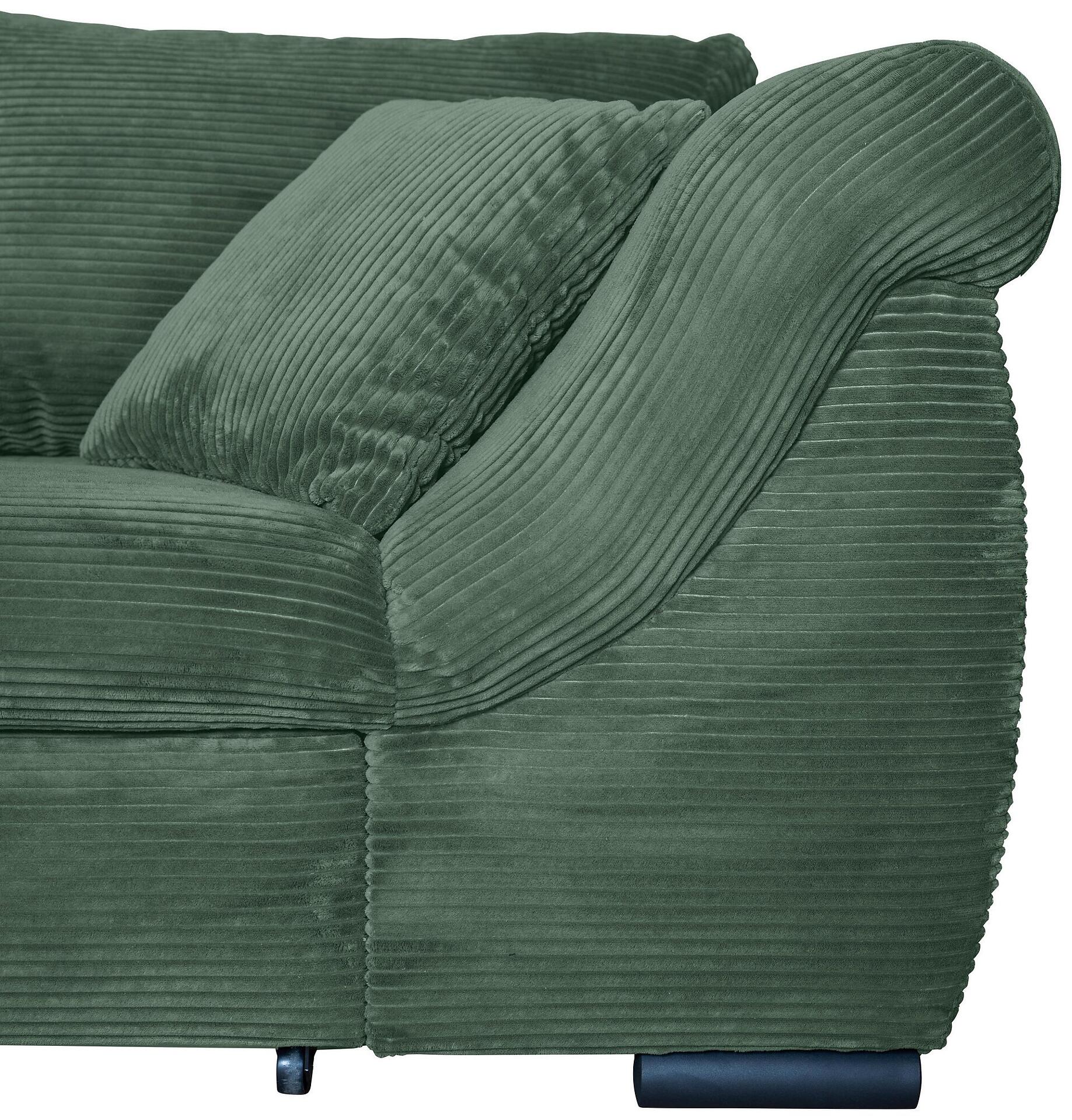 Detailaufnahme des grünen Cord-Ecksofas New Dominicana mit sichtbarer Cordstruktur, abgerundeten Armlehnen und dunkelblauen, schrägen Füßen.