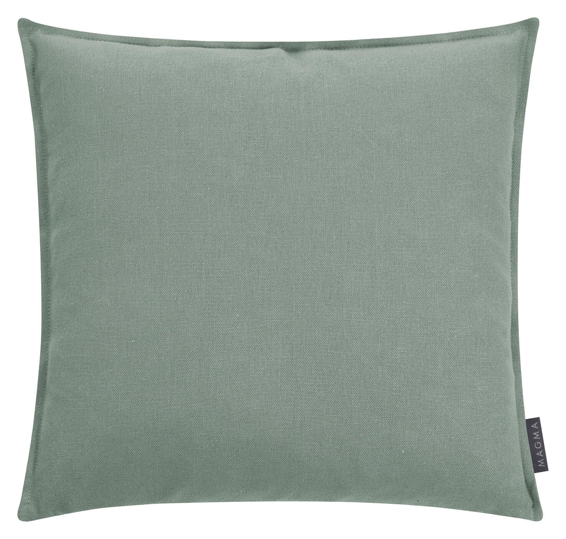 Quadratisches Kissen "Lion" in uni Jade aus 100% Leinen, frontal dargestellt mit sichtbarer Stofftextur und kleinem "MAGMA"-Etikett.