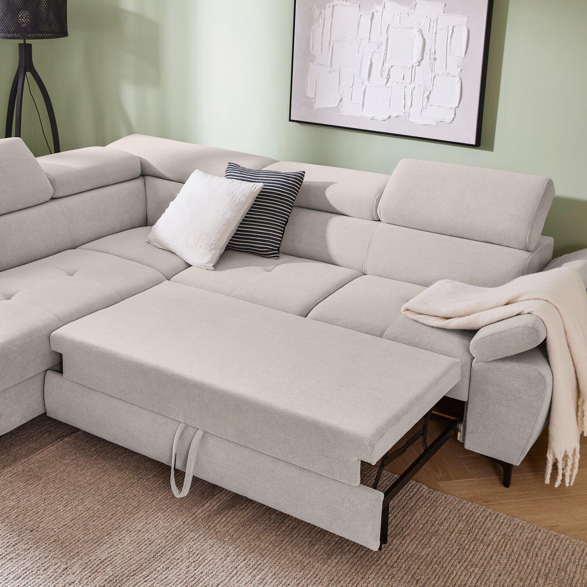 Ecksofa Combo in Grau mit hochgeklapptem vorderen Sitz, der die Schlaffunktion demonstriert.