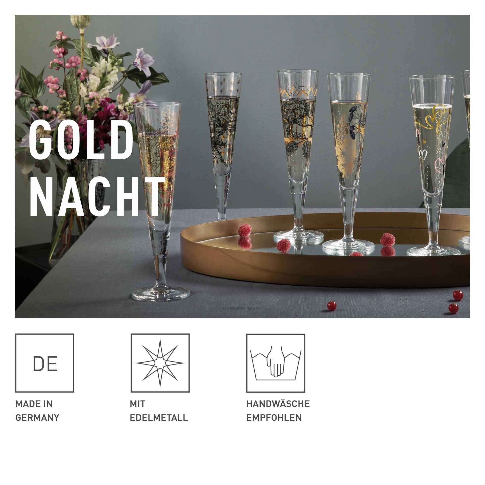 Champagnerglas-Set mit schmalen, hochgezogenen Gläsern und golden schimmernder Flüssigkeit, präsentiert auf einem Tablett mit Schneeflocken-Design, Reinigungs-Icon und "MADE IN GERMANY"-Hinweis.