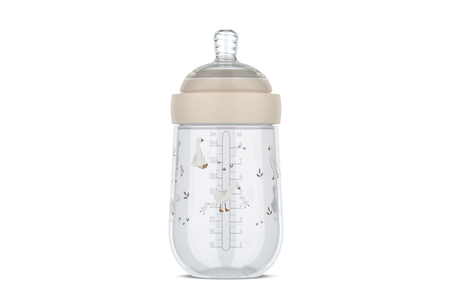 Babyflasche Mio Baby, Mio aus transparentem Glas mit beigeem Schraubverschluss, Dosierangaben und einem Enten-Motiv.