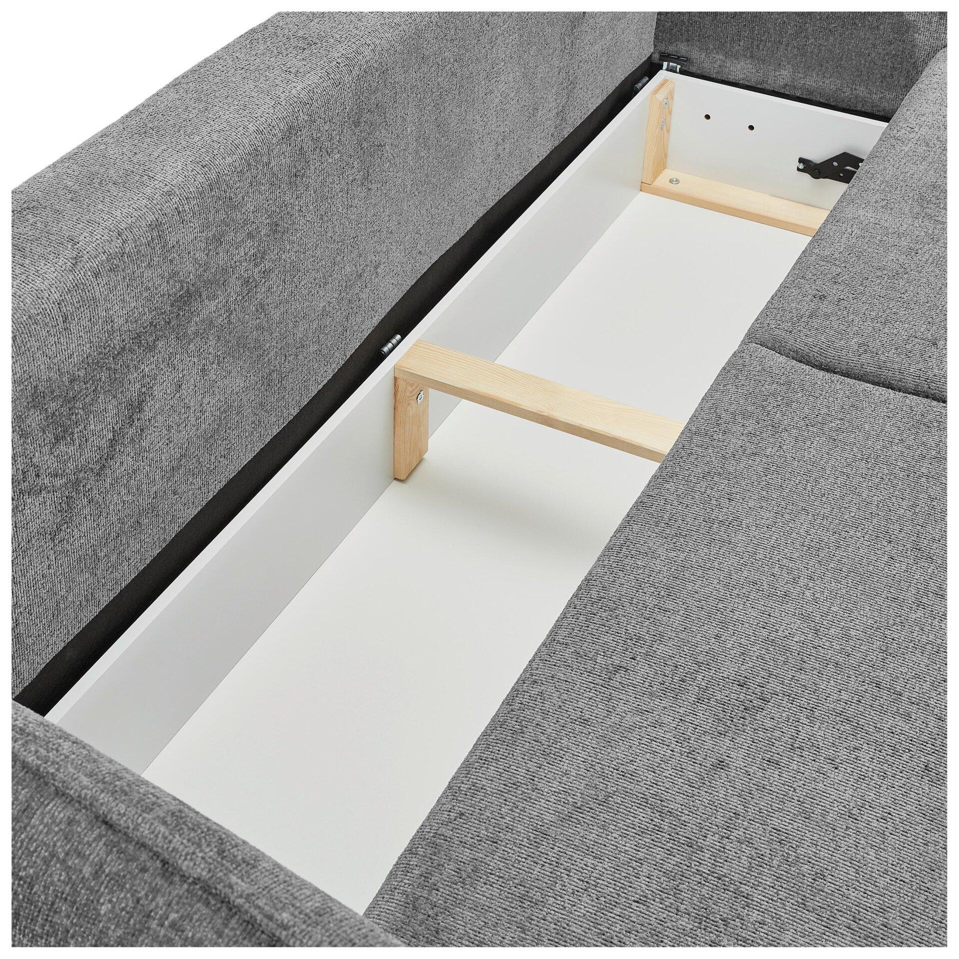 Sofa Santana mit Bettkastenfunktion, Detailaufnahme von innen mit weißer Innenwand, Holzstütze und grauem Stoffbezug.