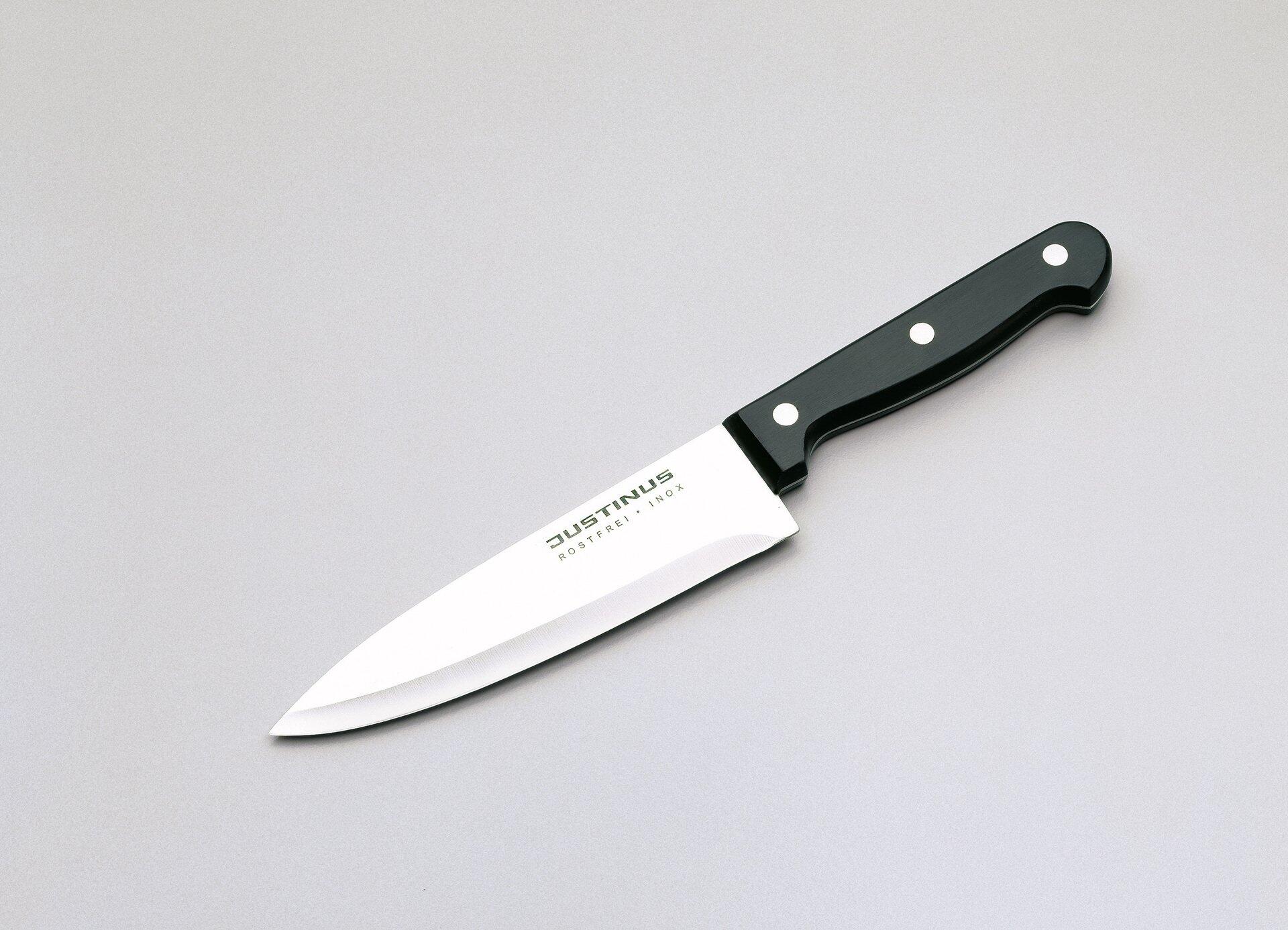 Küchenmesser JUSTINUS Rostfrei, kleine Küchenchef Kochmesser mit ergonomischem Bakelitgriff und scharfer, feiner Edelstahlklinge in 3/4-Perspektive.