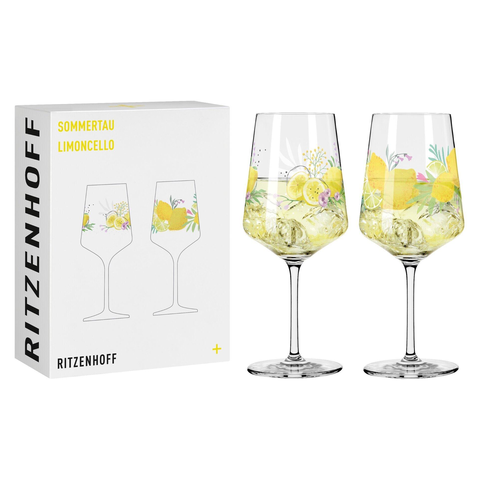 Aperitifglas-Set mit floralem Dekor aus Zitronenblüten und Blättern, dargestellt in einer attraktiven Geschenkbox, leicht seitlich aufgenommen, um die schlanke Form und den Standfuß der Gläser zu zeigen.