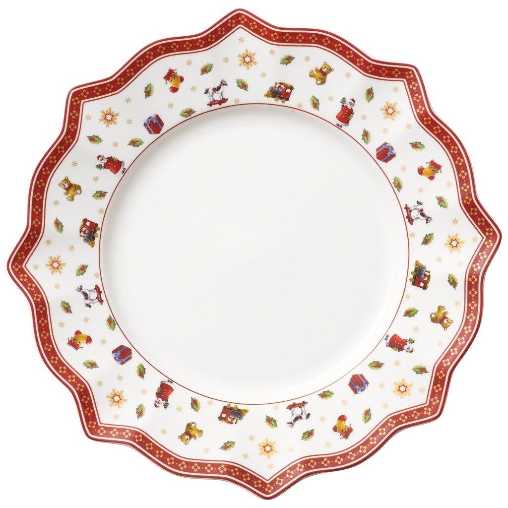 Weißer Speiseteller "Toy's Delight" von Villeroy & Boch mit gewelltem, rotem Rand und weihnachtlichem Dekor.