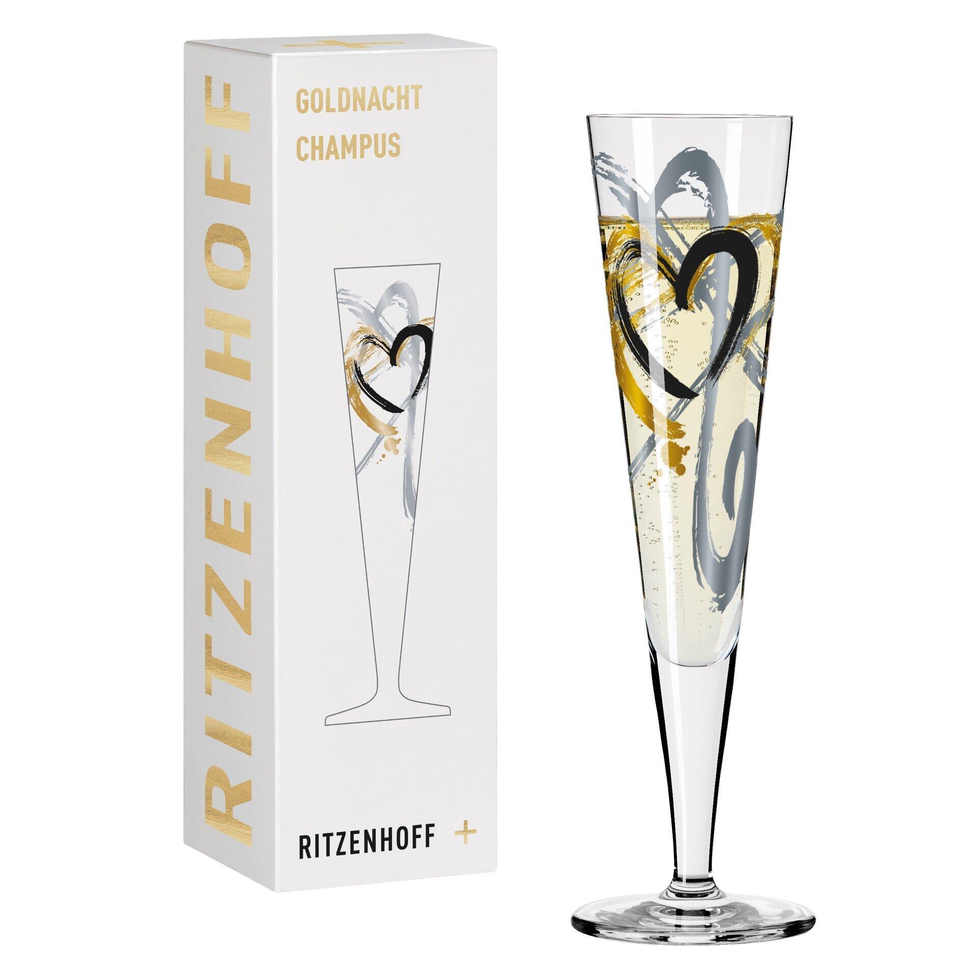 Champagnerglas von RITZENHOFF mit dekorativen goldenen Herzen und Blasen im Inneren, verpackt in einer Geschenkbox.