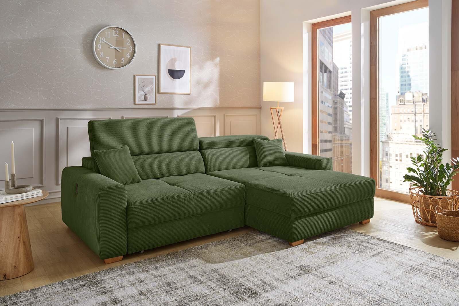 Grüne Wohnlandschaft "Slider" mit Cordbezug, aus der linken Perspektive fotografiert, zeigt eine Segmentcouch mit verstellbaren Kopfstützen und einer Klappbett-Armlehne.