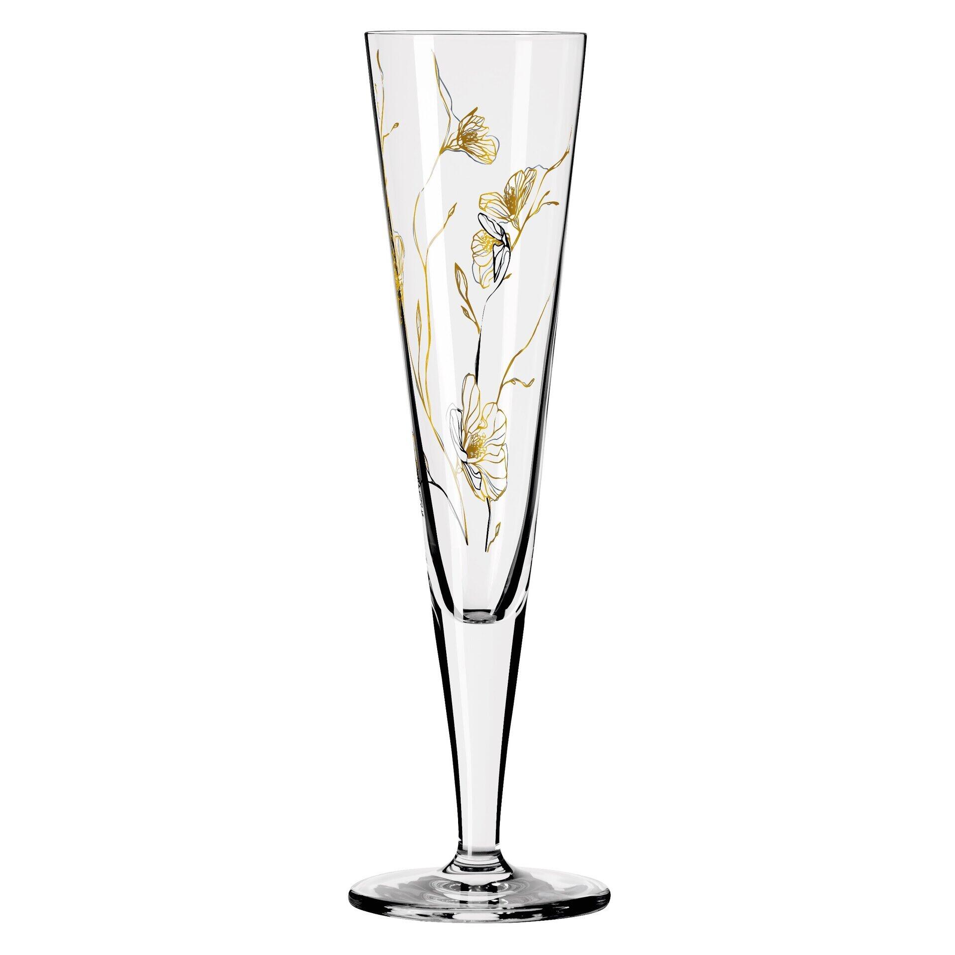 Champagnerkelch mit floralen Goldapplikationen, hoch und schlank zulaufend, in Frontalaufnahme.
