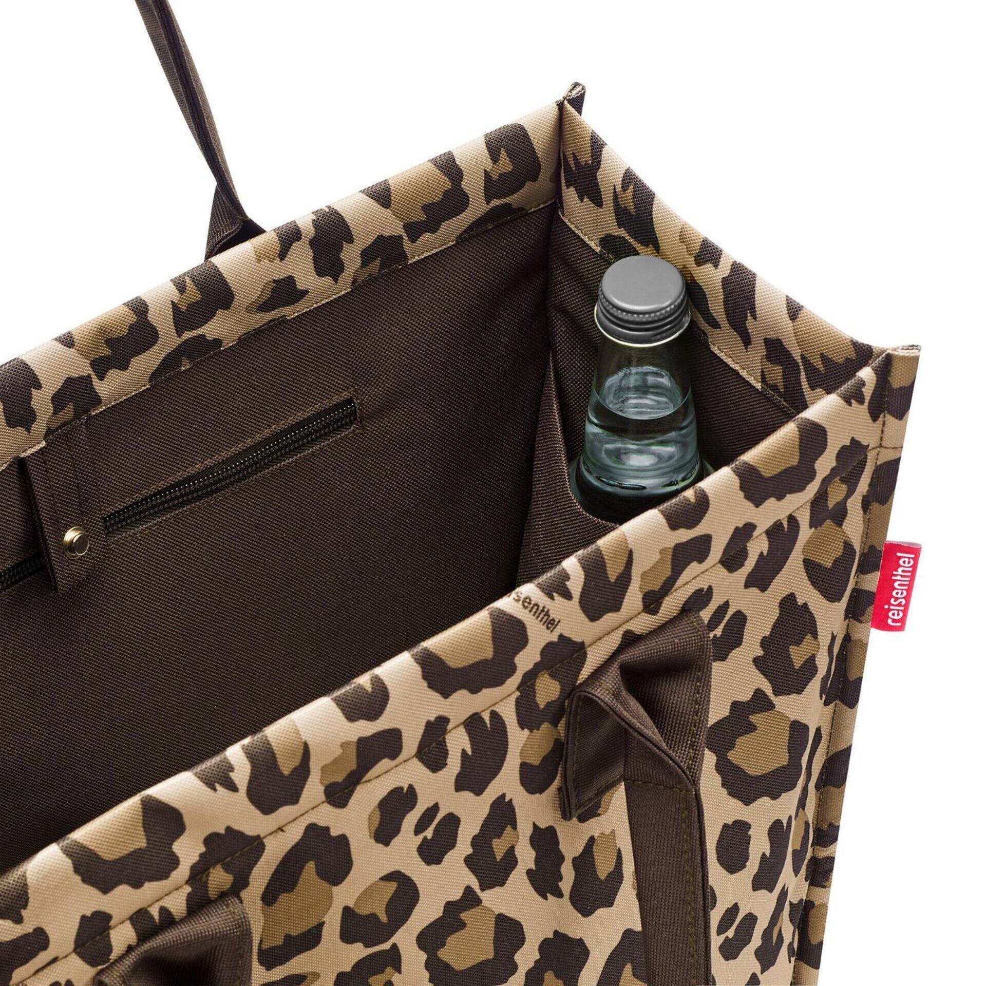 Daily Shopper Tragetasche mit Leopardenmuster, geräumiges Design mit stabilem Griff, aufgesetzter Reißverschluss-Tasche und Innenraum im gleichen Muster.