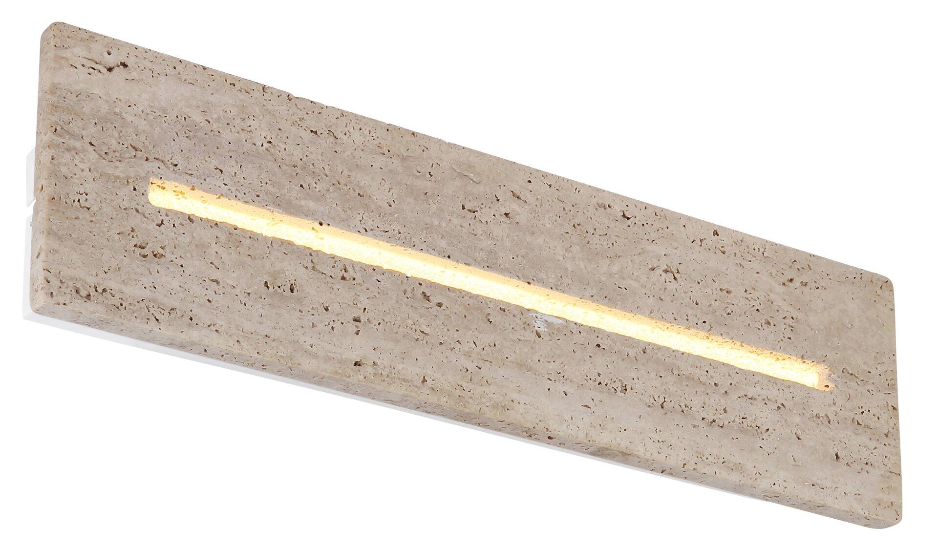 Wandleuchte ROJAS aus Travertin mit integrierter LED-Leiste, die einen beleuchteten, durchbrochenen Effekt erzeugt und in warmem Gelbton nach vorne leuchtet.