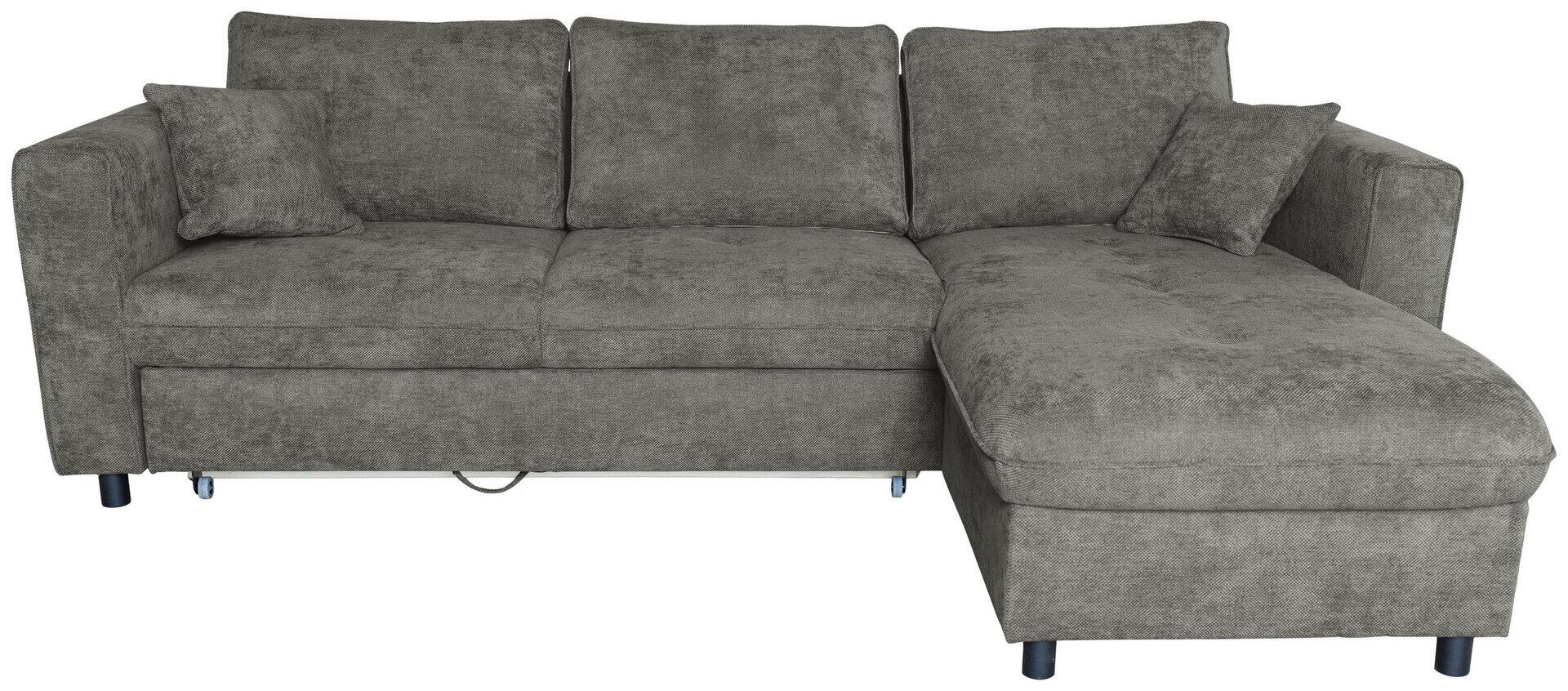 Ecksofa Tokyo in Grau mit strukturiertem Gewebe und einem ausgezogenen Teilsessel, dessen Bettfunktion durch einen sichtbaren Zug bedient wird, sowie dunklen, metallischen Füßen.