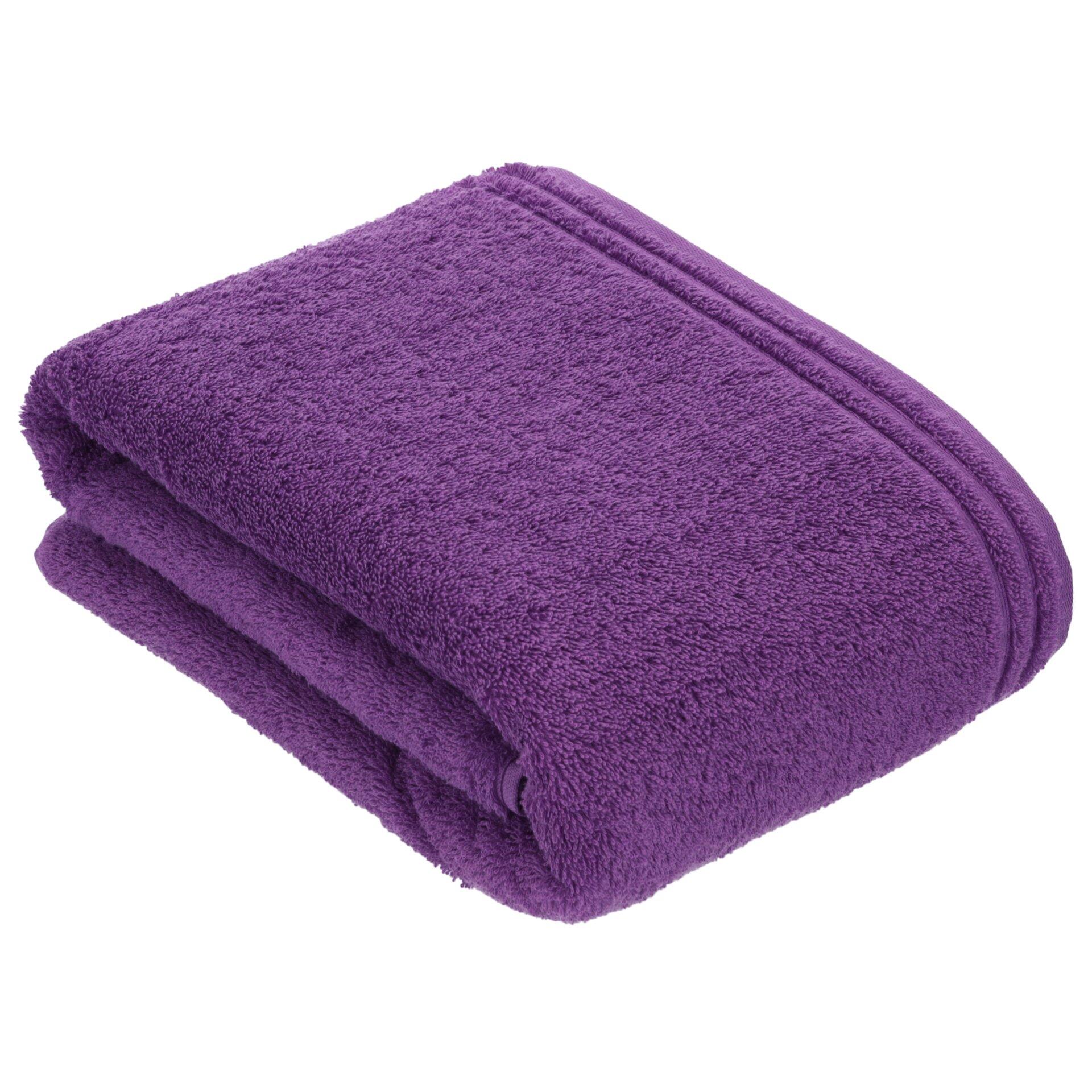 Violettes Badetuch "Calypso Feeling" aus Baumwolle, schräg von oben fotografiert und gefaltet zur Darstellung der weichen Textur und Dicke.