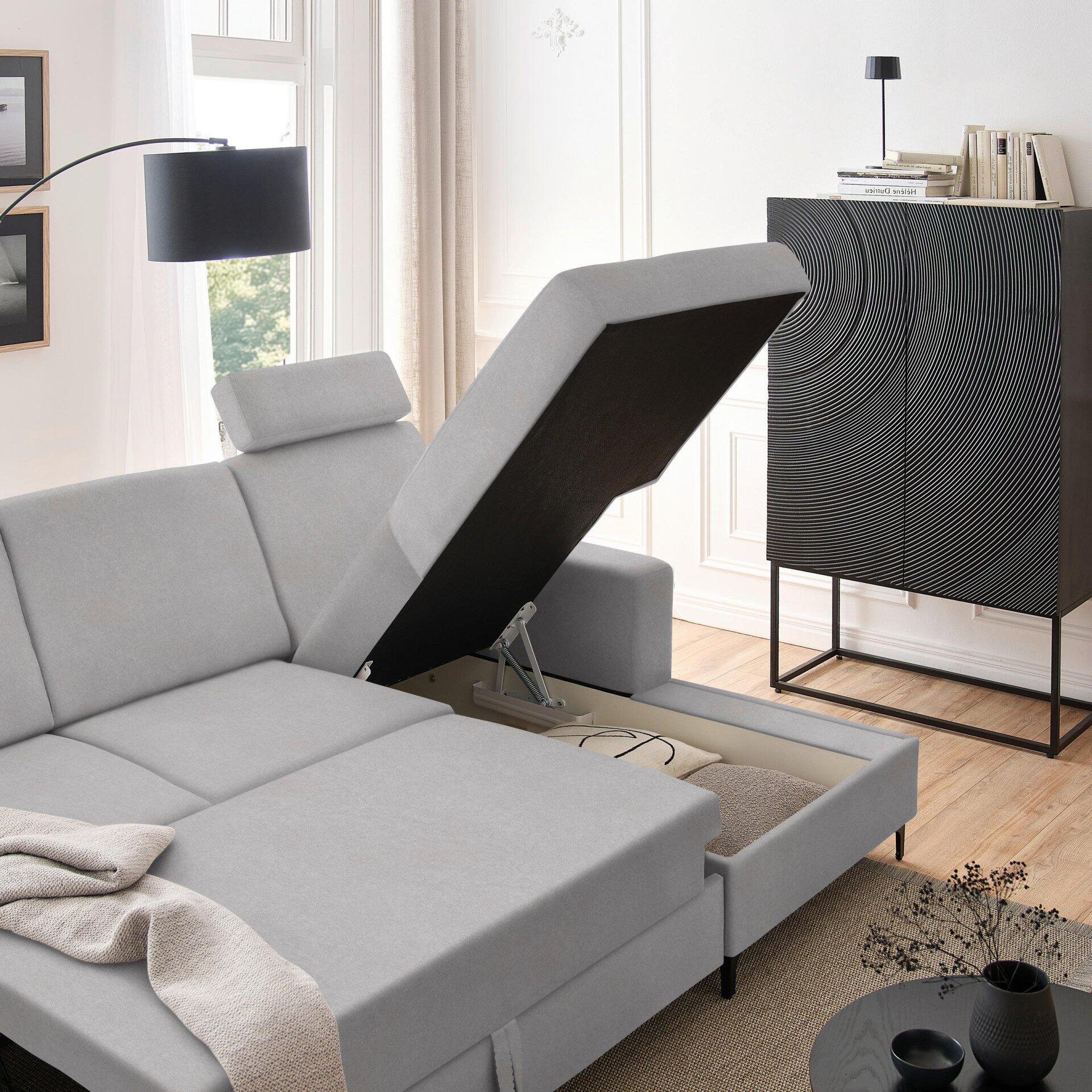 Ecksofa Balina mit ausgeklappter Schlaffläche und Bettkasten, Detailaufnahme der Schlaffunktionsmechanik aus Seitenperspektive.