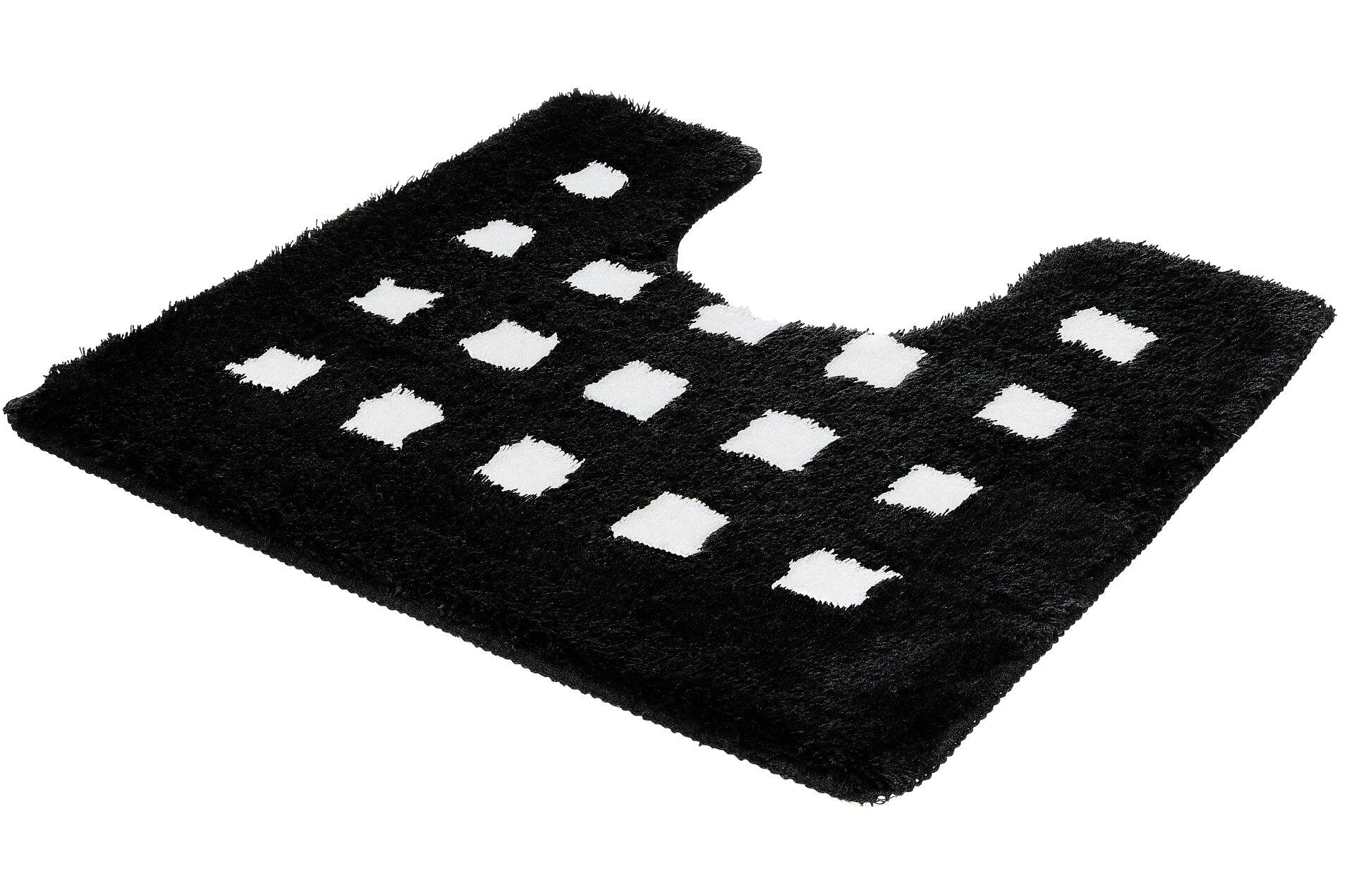 Schwarzer WC-Vorleger "Boxes" aus dichtem, flauschigem Polyacryl mit geometrischem Weiß-Quadrat-Muster, detailreich in dreiseitiger Perspektive abgebildet.