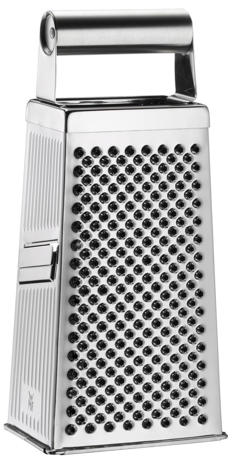 Silberfarbene WMF Vierkantreibe Gourmet mit ergonomischem Griff und unterschiedlichen Reibebenen für verschiedene Texturen.