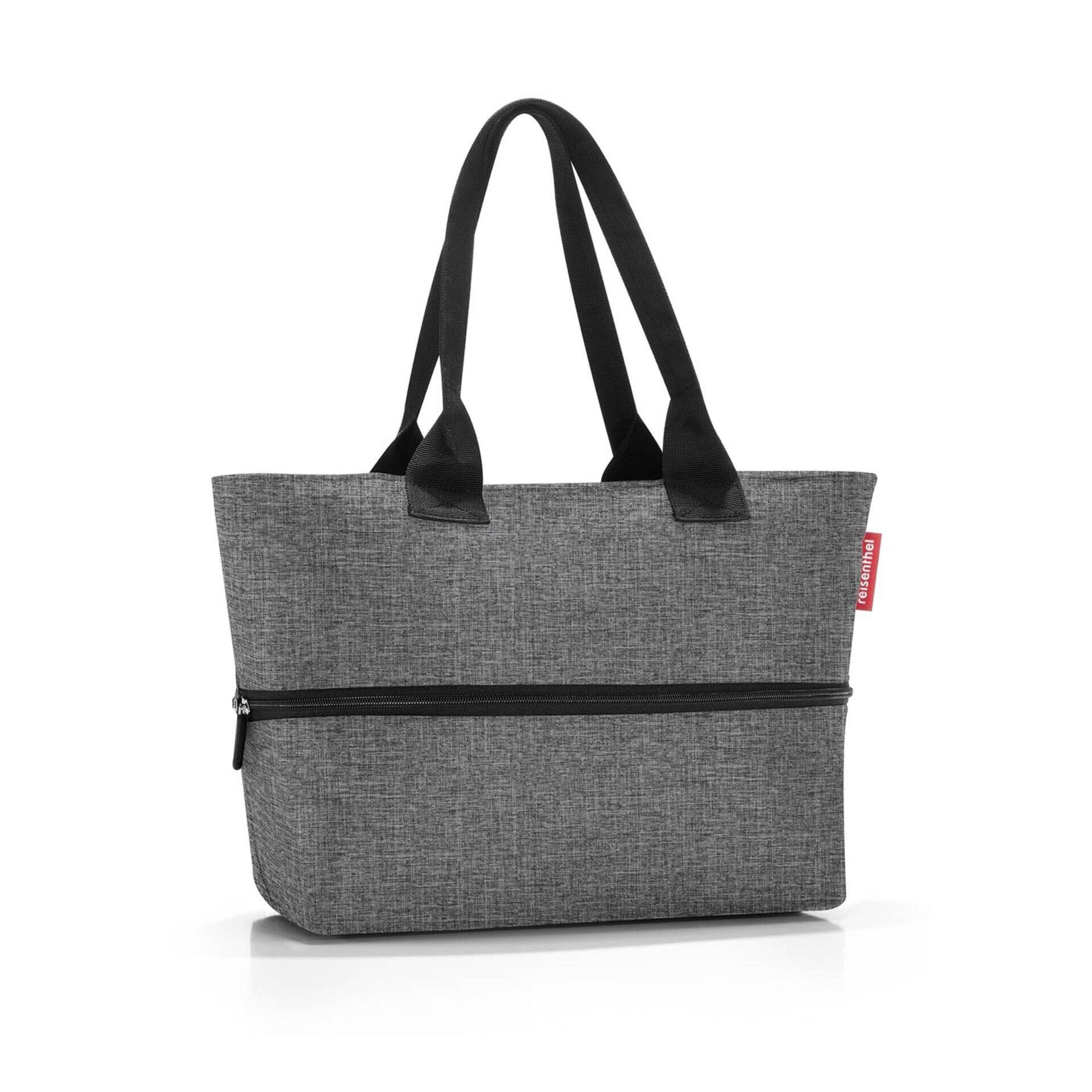 Graue Shopper-Tasche e1 mit strukturierter Oberfläche, zwei Reißverschlussfächern und schwarzen Henkeln, frontal und leicht von unten abgebildet.