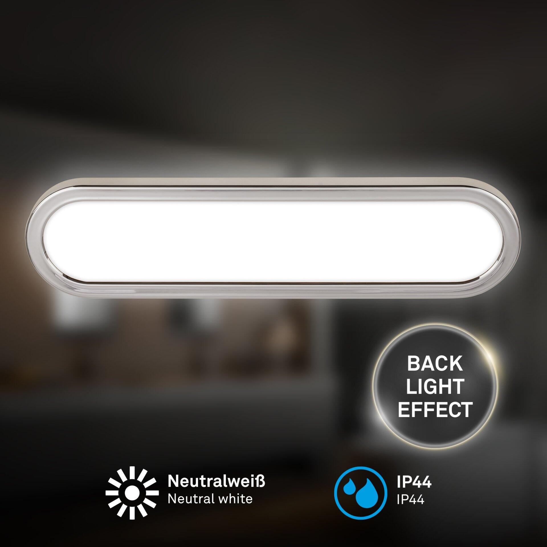 Wandleuchte Pil, oval geformt mit silberfarbener Fassade und weißer, beleuchteter Fläche, zeigt einen Back Light Effekt und ist für den Einsatz im Badezimmer mit IP44-Schutz geeignet.