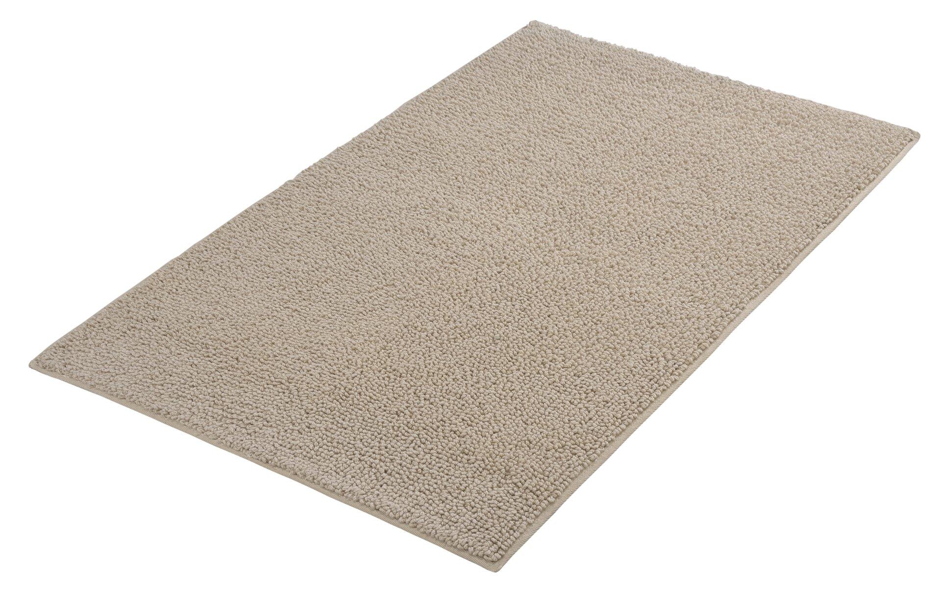 Badteppich Chrissy aus Baumwolle mit strukturierter Oberfläche und Noppen, schräg von oben abgebildet.