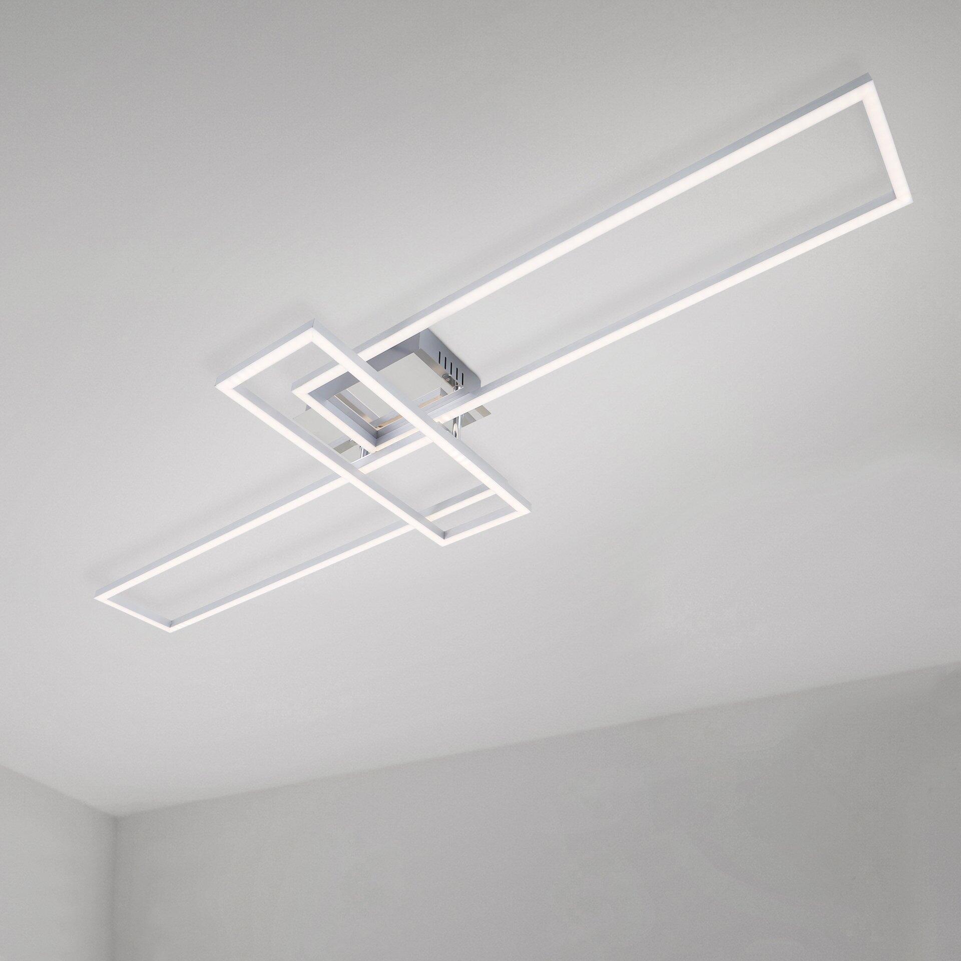 Deckenleuchte Frame mit rechteckigen LED-Elementen in einem geometrischen Muster, aus einem schrägen Blickwinkel fotografiert.