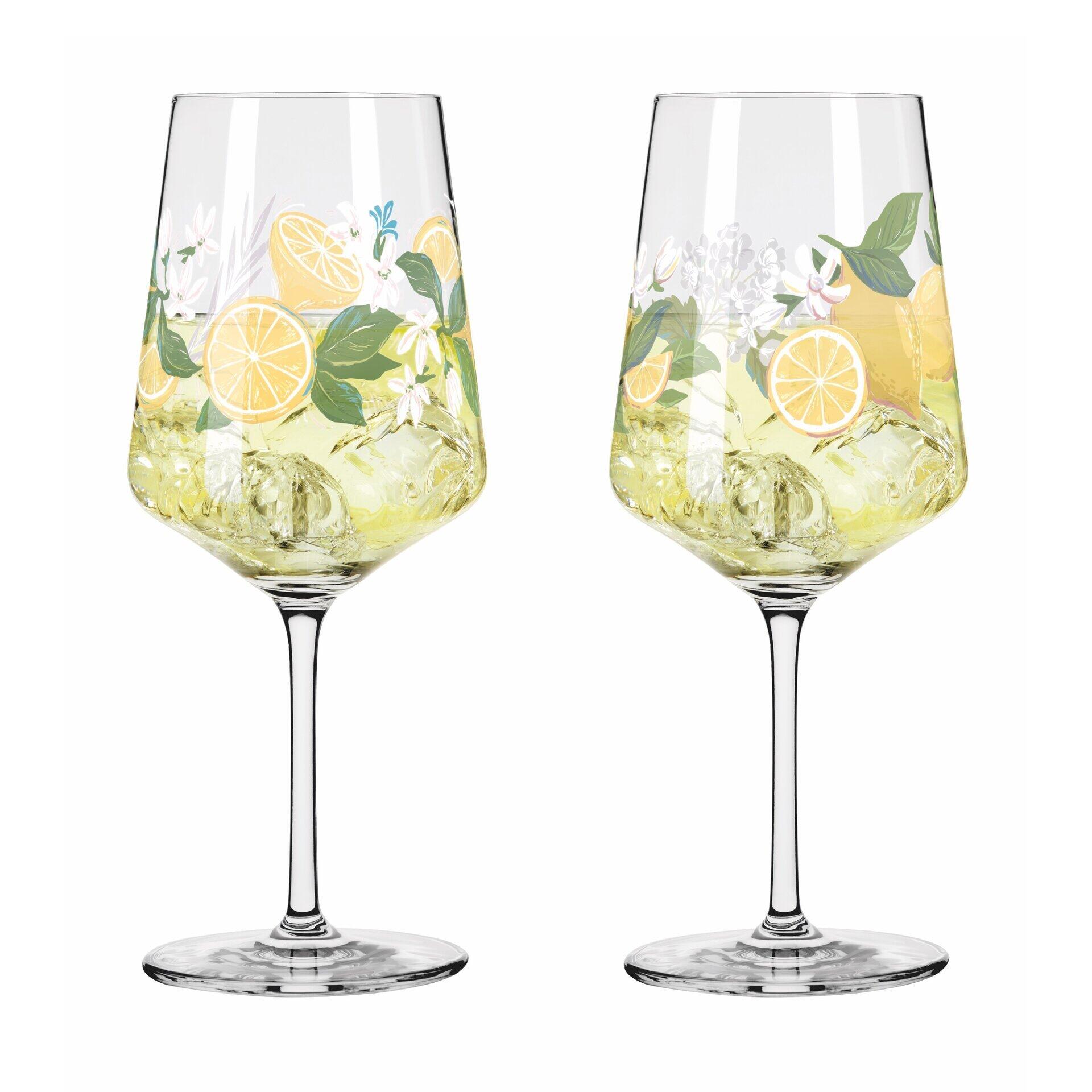 Aperitifglas-Set mit dekorativem Zitronenmuster, zwei Gläser mit Flüssigkeit und Eiswürfeln, in frontaler Perspektive.