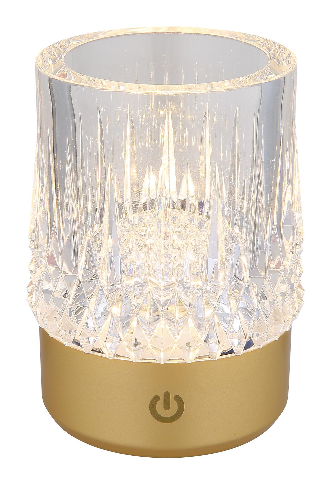 LED-Tischlampe LIZZY mit goldenem Fuß und durchbrochenem, kristallartigen Schirm, der warmweißes Licht abstrahlt und über einen Touchdimmer gesteuert wird.