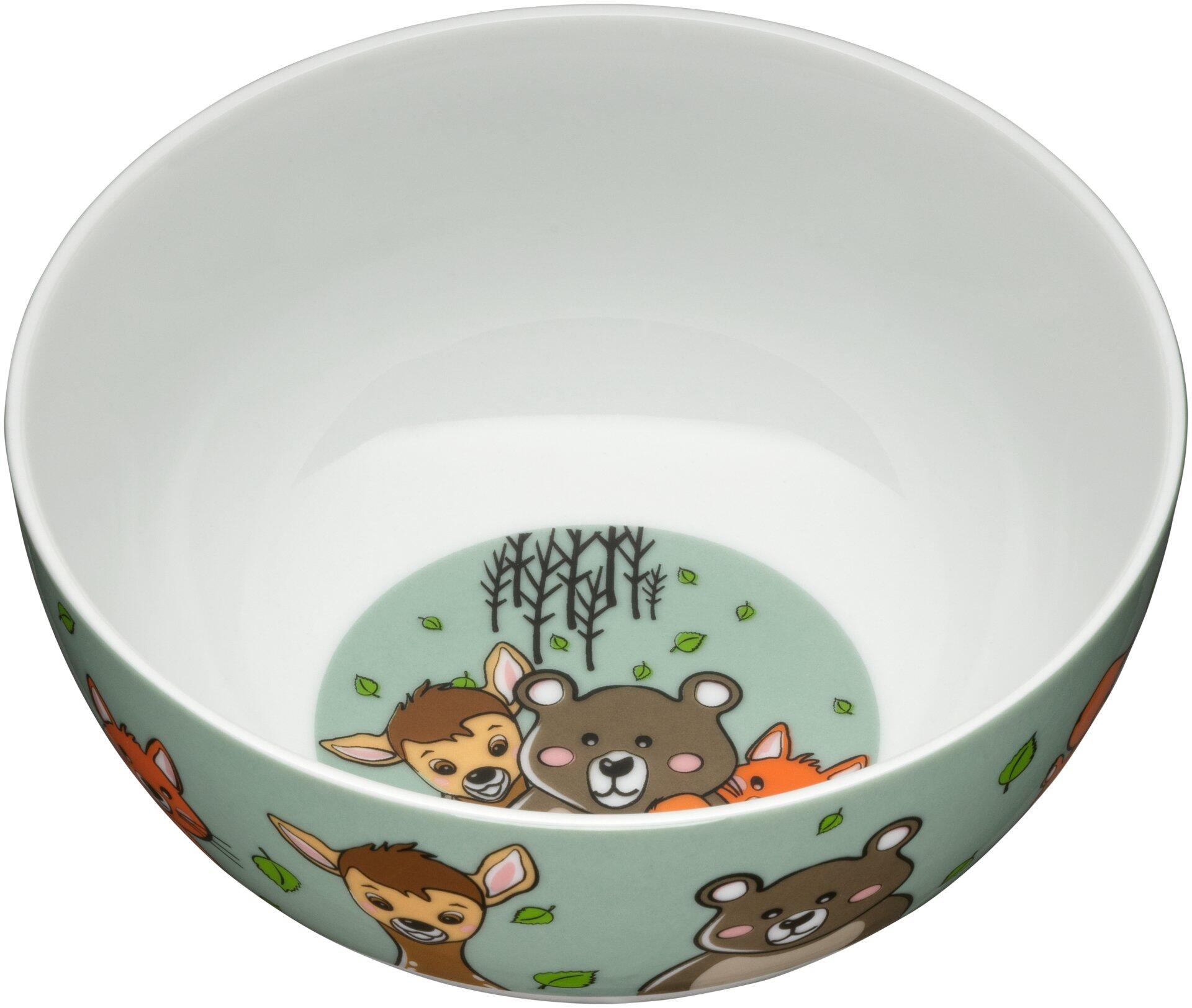 Nahaufnahme eines weißen Schälchens mit hellem Grünem Dekor und Tierfiguren für das WMF Kinderbesteck-Set.