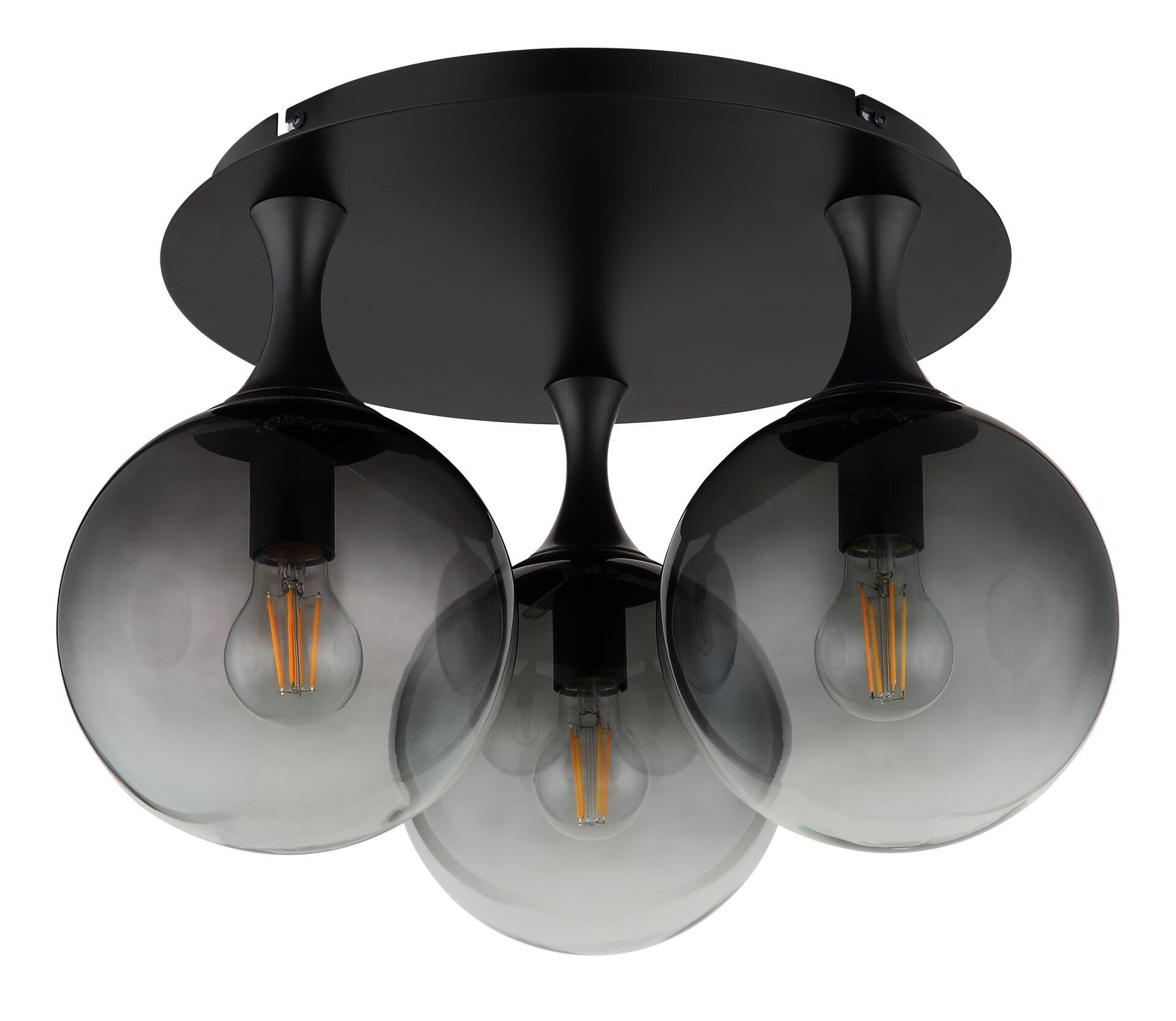 Deckenleuchte DALTON mit drei schwarzen Armen und kugelförmigen Glaskugeln, die im Gegenlicht das Design und die verzweigten Edison-Glühfäden hervorheben.