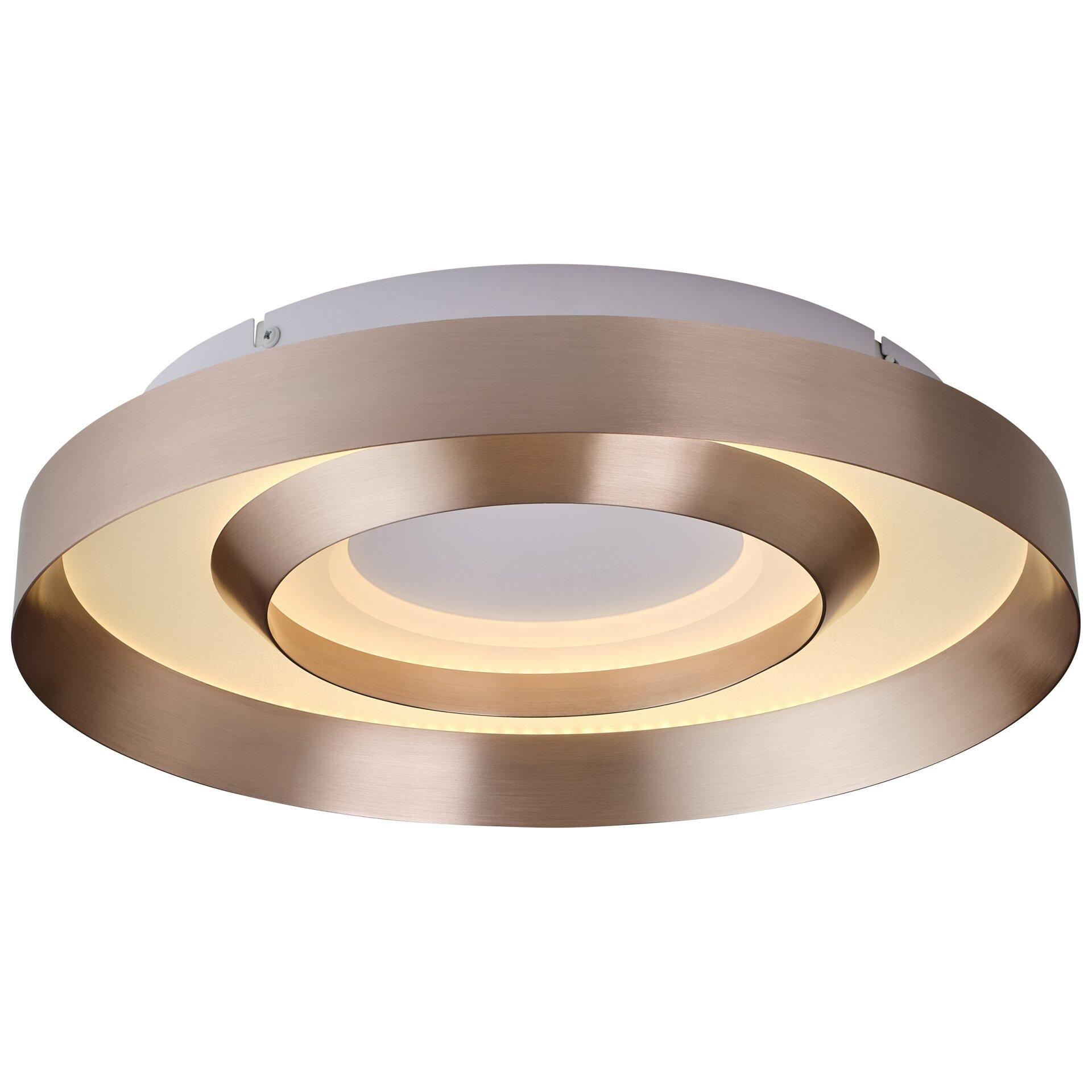 Deckenleuchte Onix: Moderne Deckenleuchte mit konzentrischen, goldfarbenen Ringen und dimmbarem, warmweißem Licht im Gegenlicht dargestellt.