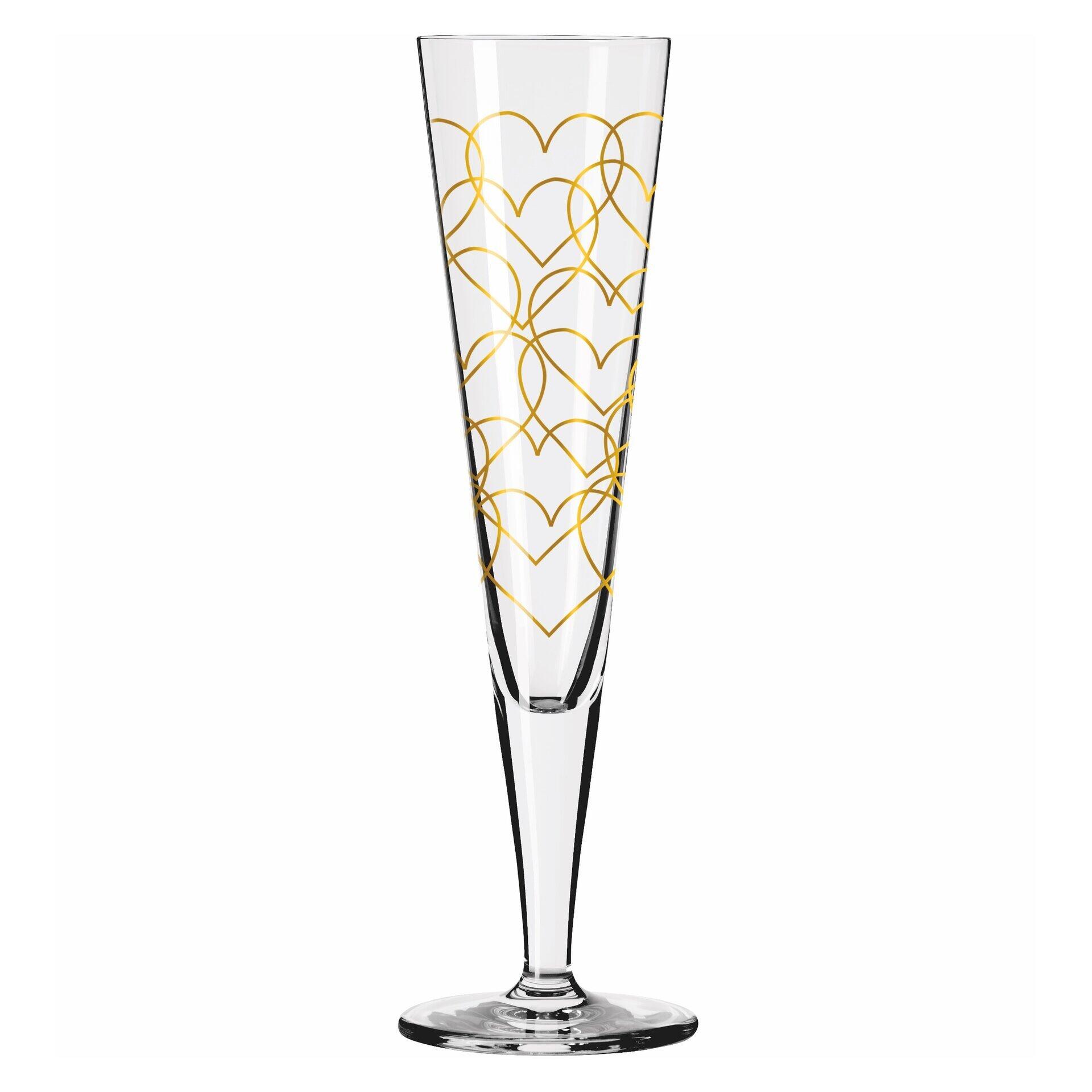 Champagnerglas mit goldenem Herzmuster und langem Stiel in Frontalperspektive.