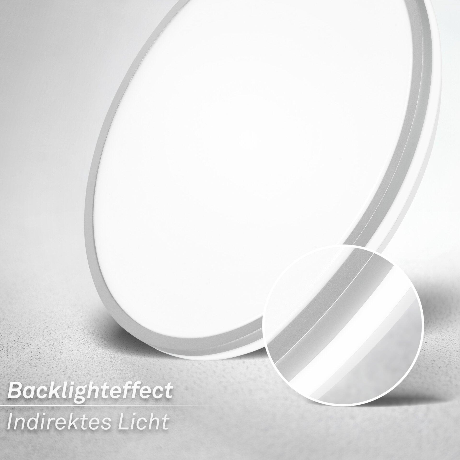 Runde Wand- und Deckenleuchte Lana a mit silberfarbenem Rahmen und integriertem indirekten Licht, das durch einen Backlight-Effekt einen reflektierenden Glanz erzeugt.