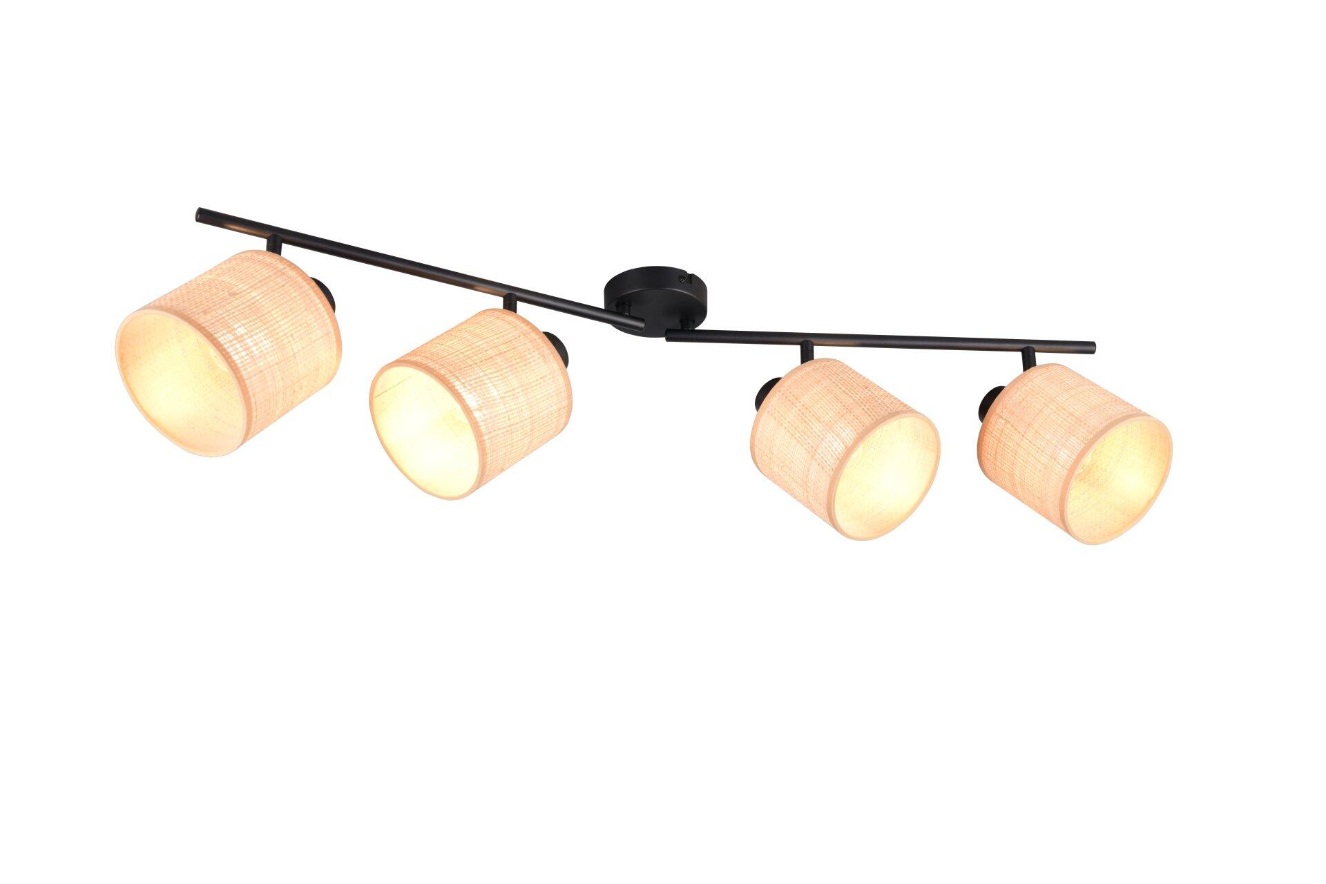 Deckenleuchte Strahler Aimee mit gebogener, schwarzer Metallstange und vier zylindrischen, sandfarbenen Lampenschirmen, die einen warmen Lichtschein erzeugen.