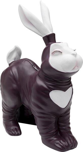 Spardose Fetish Bunny Standing Burgund: Ein handbemalter, lila Hase mit weißem Kopf und herzförmigem Loch, dargestellt in einer leicht erhöhten, seitlichen Perspektive mit sichtbarem Reißverschluss.
