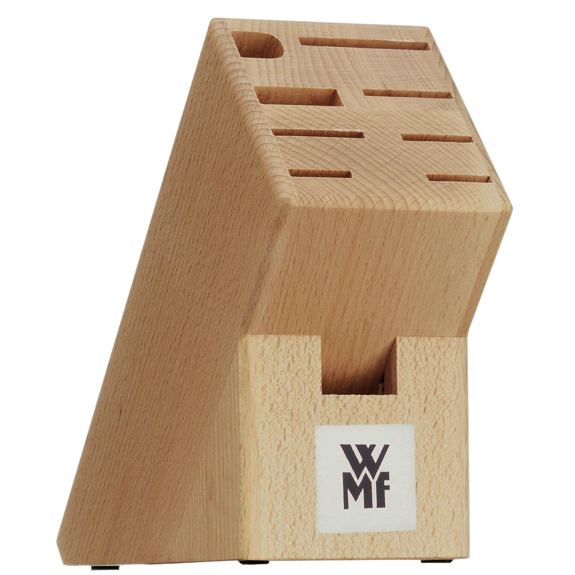 Messerblock aus hellem Holz mit schräger Oberkante und Schlitzen für Messer, Gabel und andere Besteckteile, WMF Logo sichtbar.