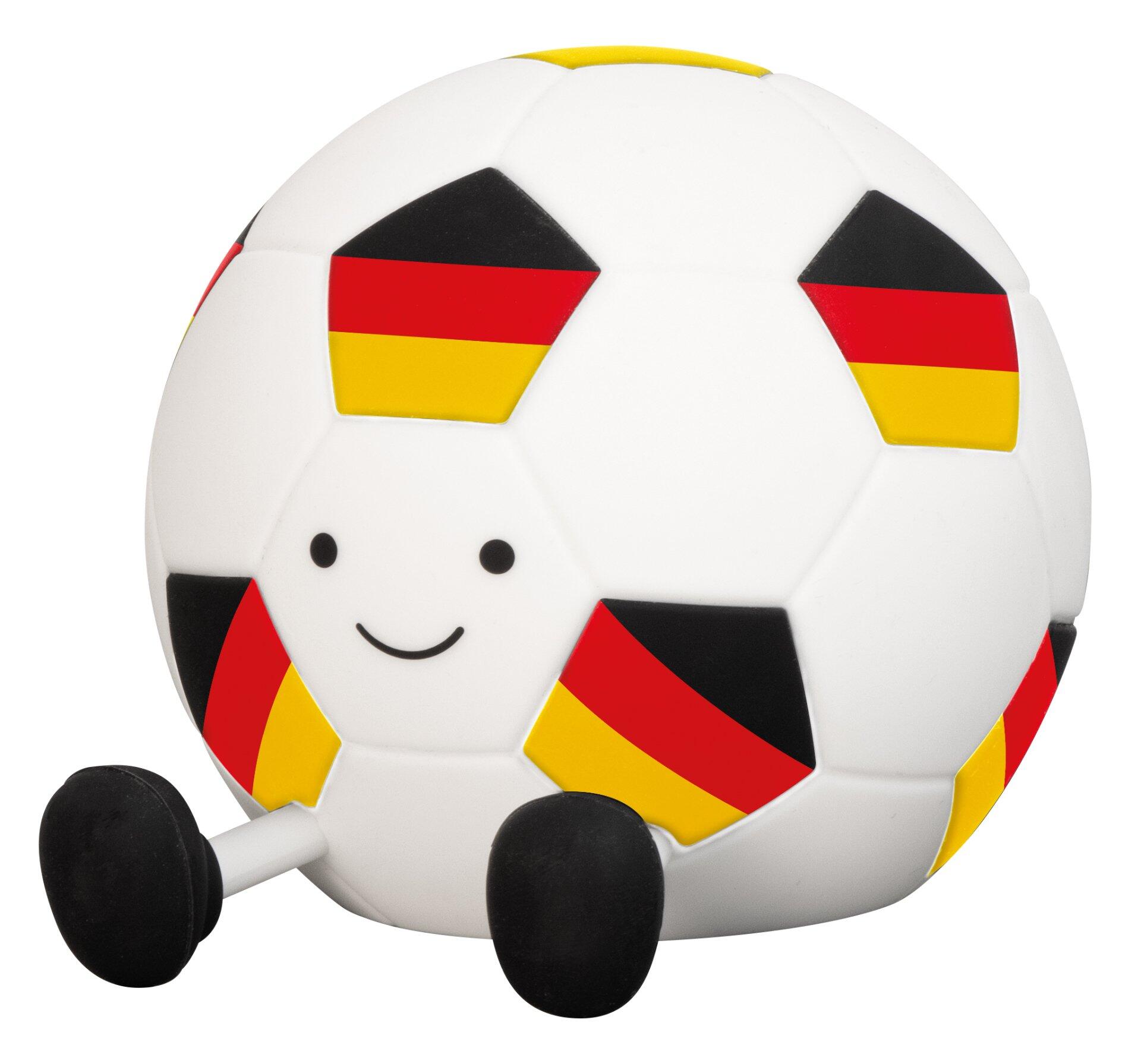 Tischleuchte Jogi im Design eines Fußballes mit freundlichem Gesichtsausdruck und sitzender Darstellung.