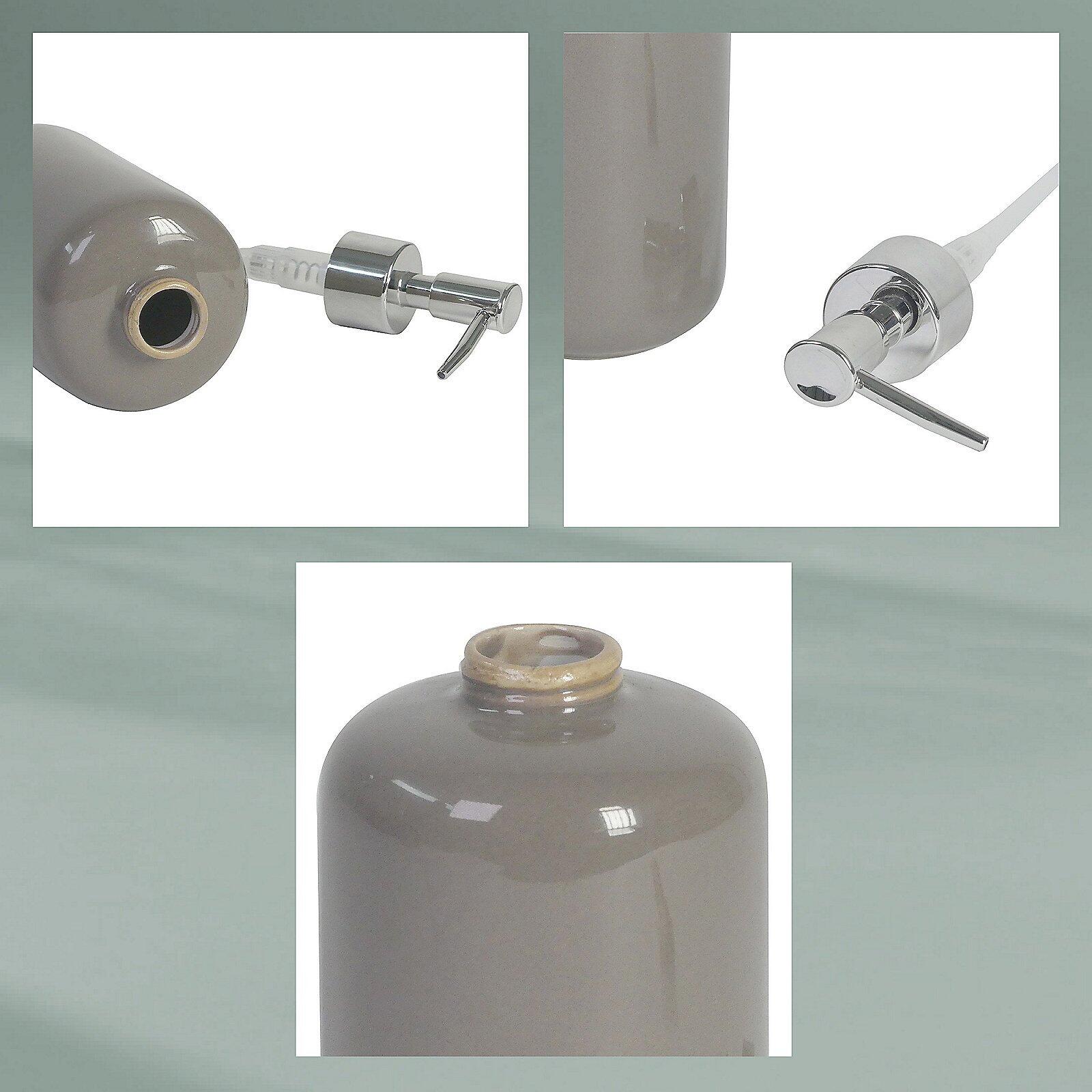 Seifenspender Isabella: Detailaufnahme des silberfarbenen Pumpmechanismus mit flexiblem Schlauch im Spenderkopf.