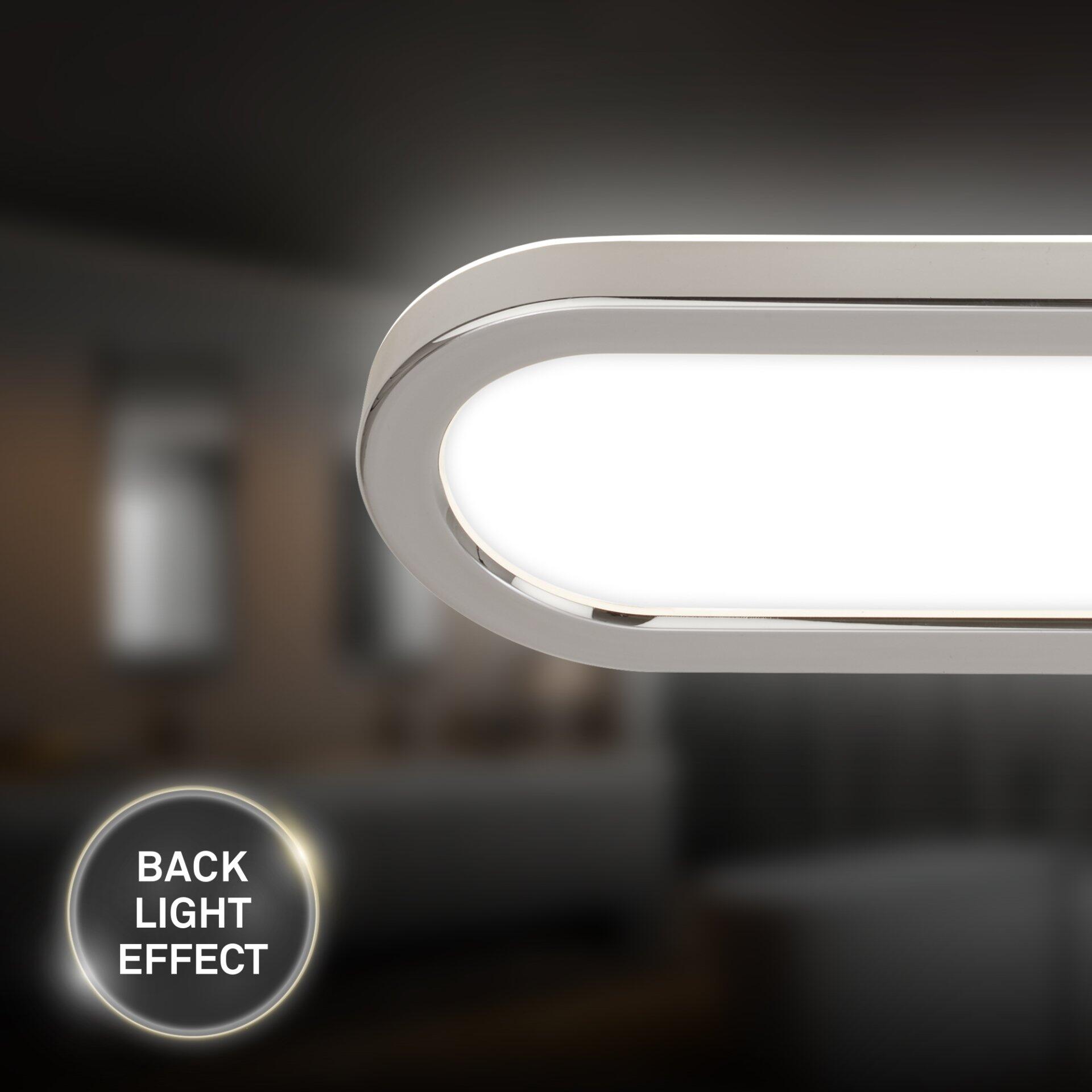 Badezimmerleuchte Pil mit silberner Metallumrandung und indirektem "Back Light Effect" aus LED-Beleuchtung.