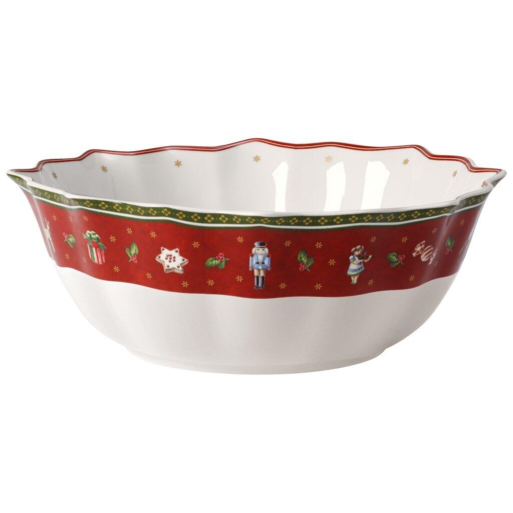 Weihnachtliche Schüssel mittel "Toy's Delight" von Villeroy & Boch mit weißem Innenraum und gewelltem, rot-grün dekoriertem Rand.