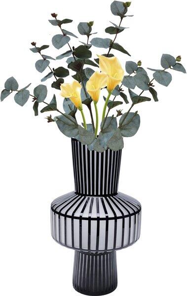 Vase Roulette Belly, mundgeblasenes Glas mit dunkelgrauem, gestreiftem Mittelteil und gelben Callabergien sowie grünen Eukalyptusblättern, frontal abgebildet.