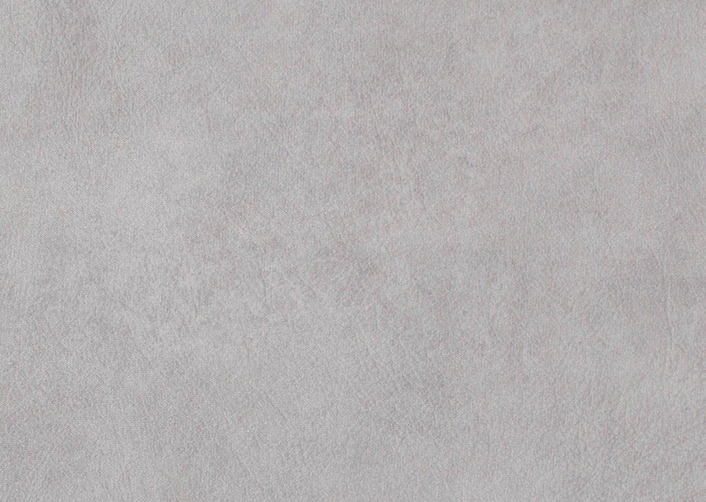 Detailaufnahme des hellgrauen, samtartigen Stoffes des Ecksofas Balina, der eine feine Textur aufweist.