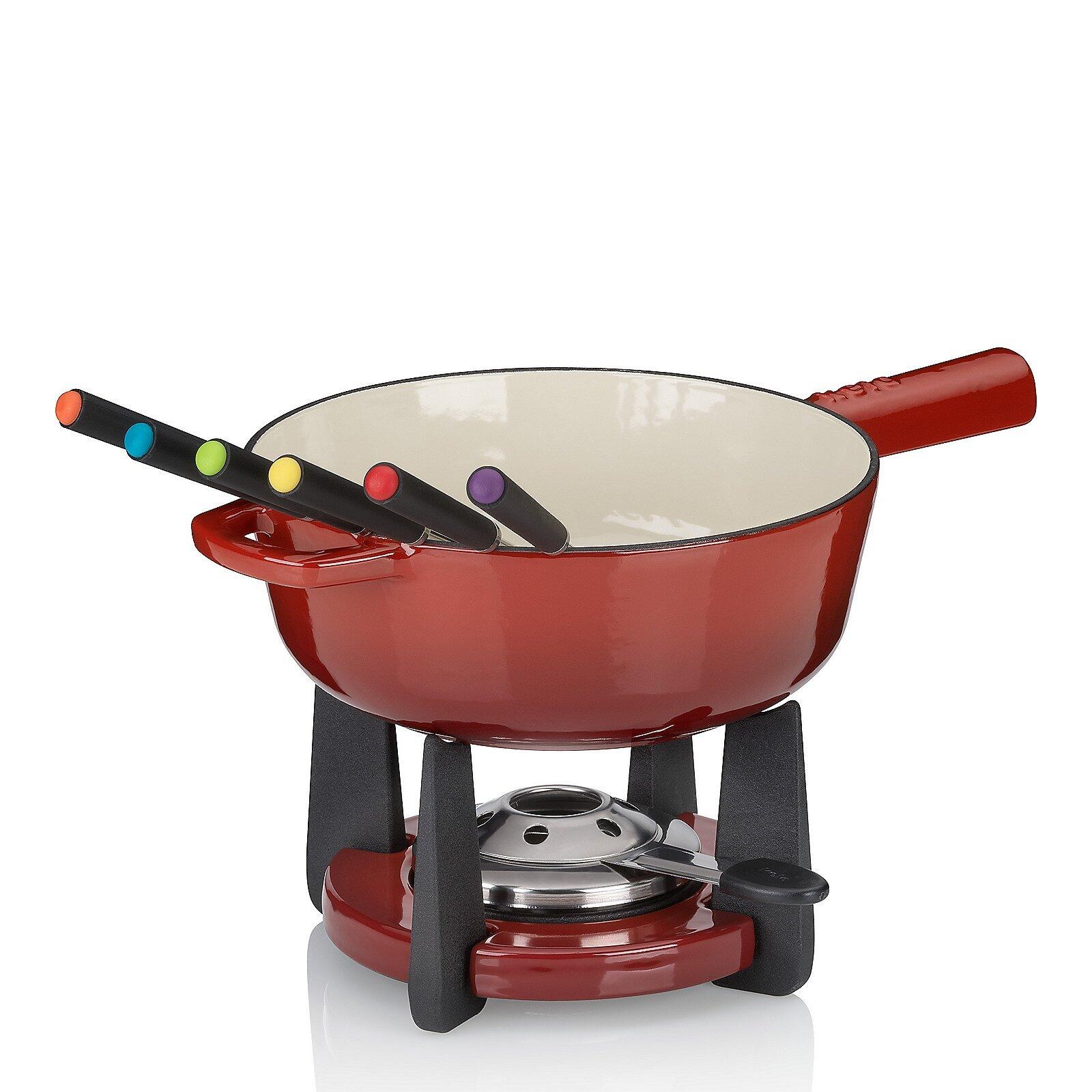 Rotes Käsefondue-Set Calido mit rundem Topf, breitem Rand, farbigem Griff und schwarzer Basis mit Temperaturregler.