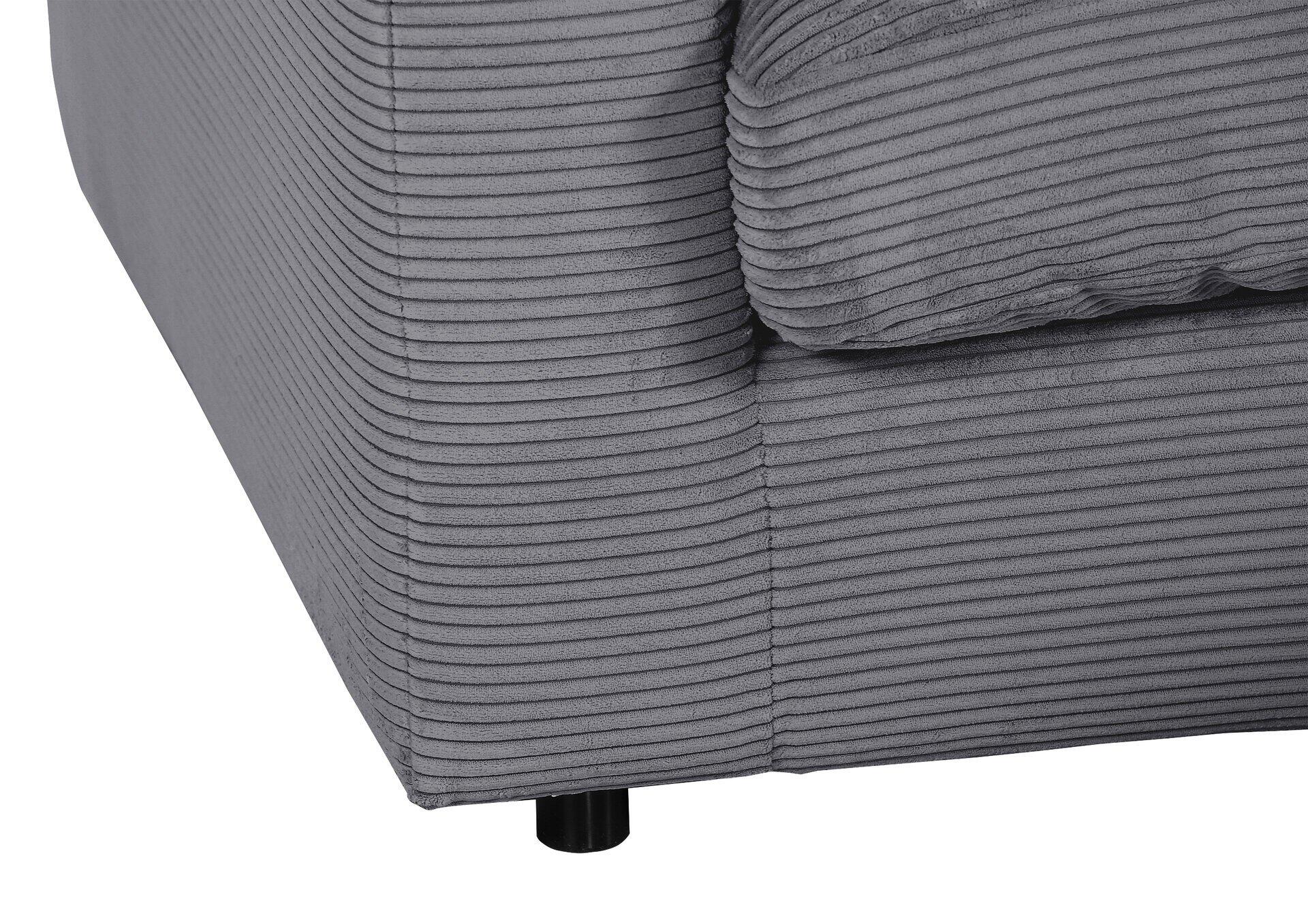 Detailaufnahme eines grauen Sofa-Elements des Ecksofas Donato mit Cordstoffbezug und schwarzen Füßen, das die vertikale Textur und die geometrische Form betont.